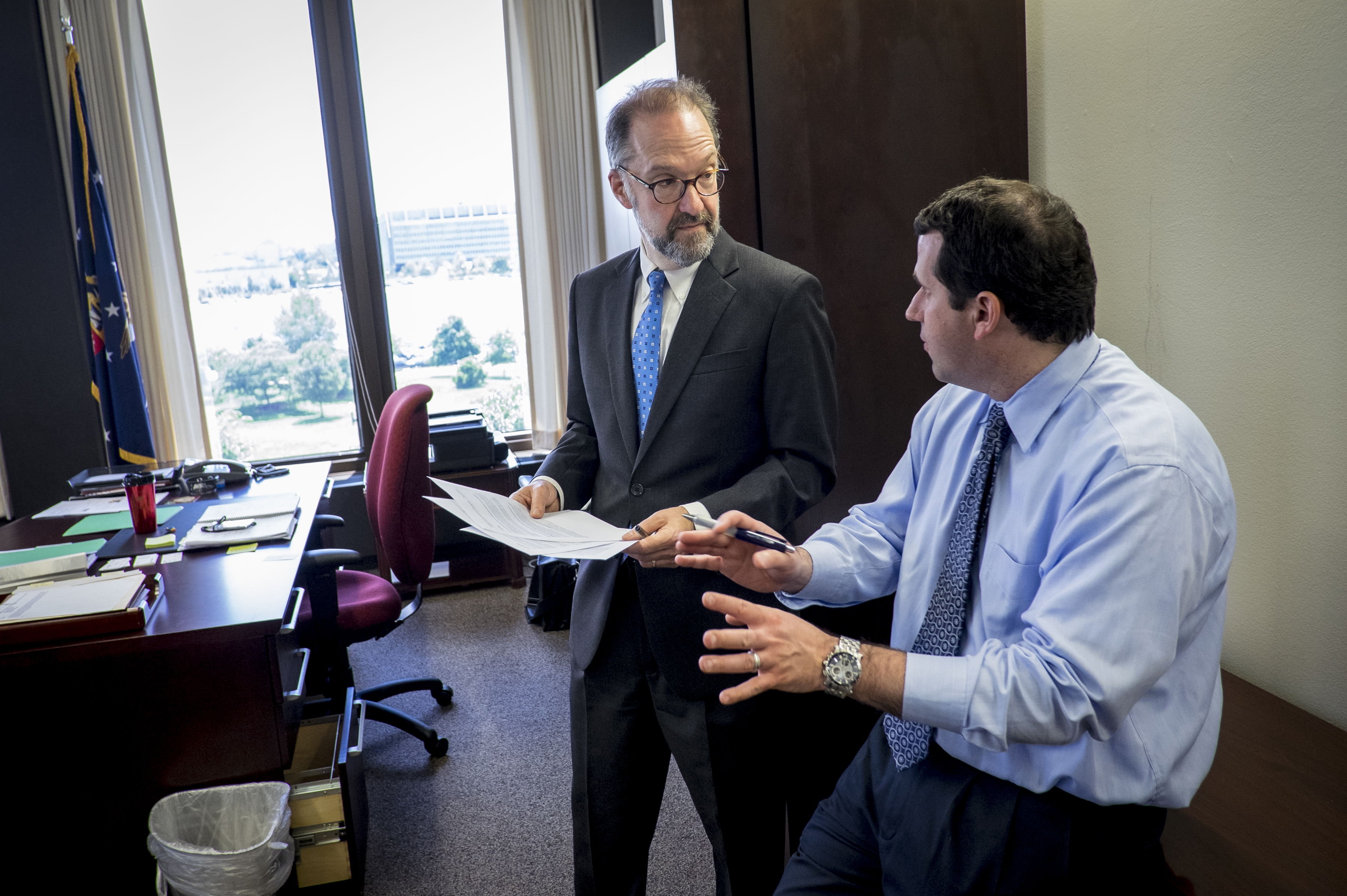 David Weil, here with director of communications Michael Kravitz, faced opposition during his confirmation from Republicans and business groups.