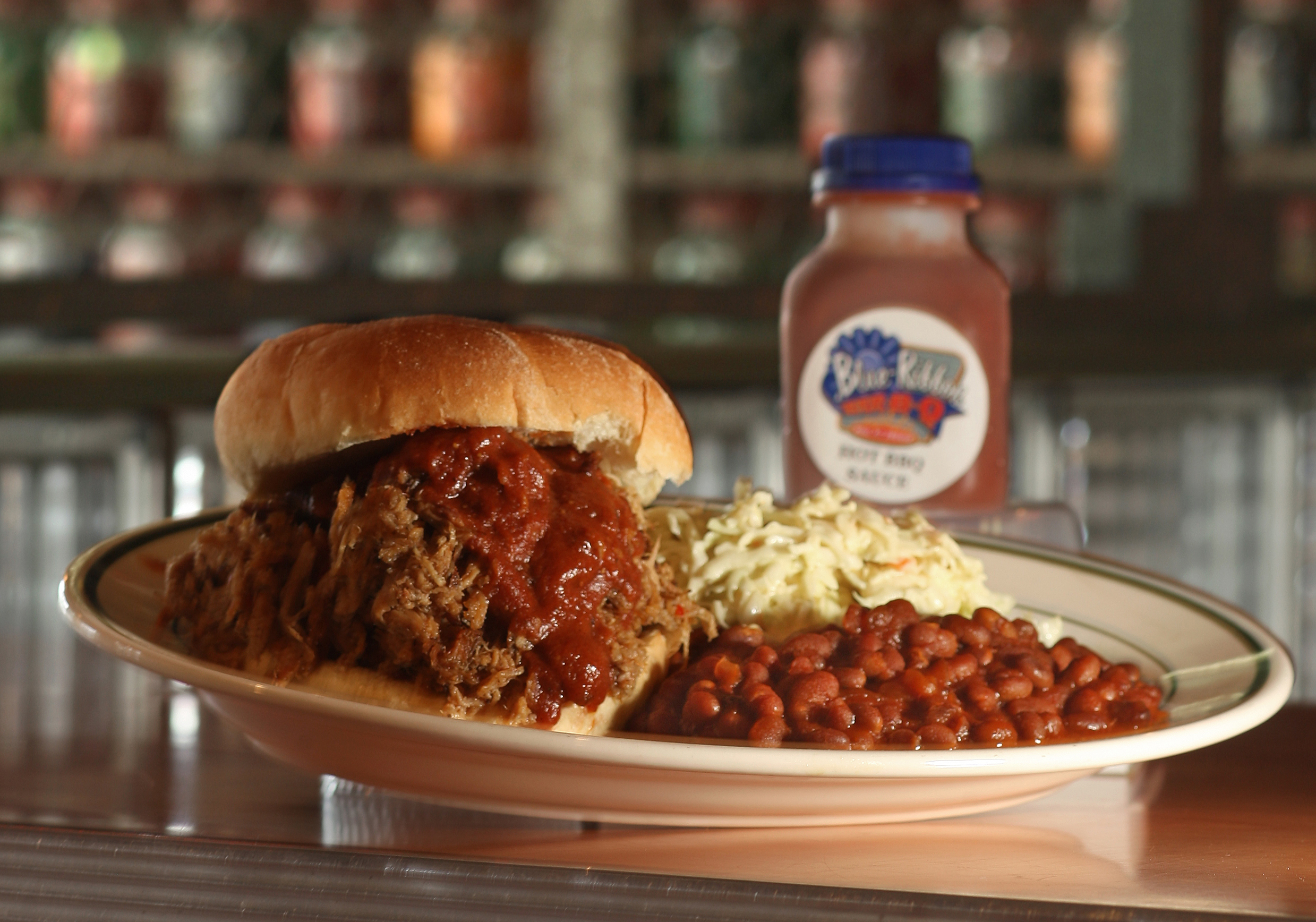 Pulled pork sandwich with coleslaw and barbecue sauce from Blue Ribbon Bar- B- Q in Newton.