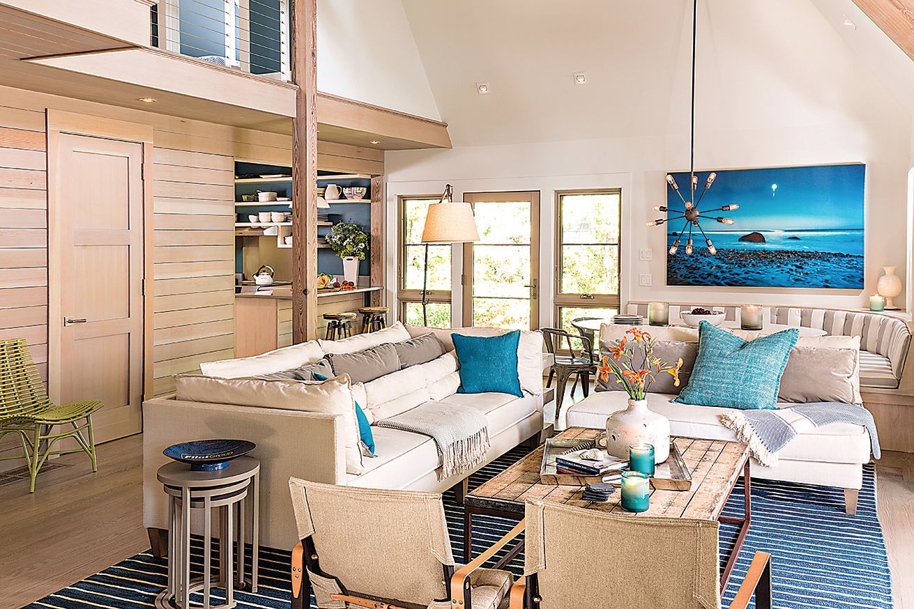 Rentschler chose a neutral palette with punchy accents of blue for the main house.