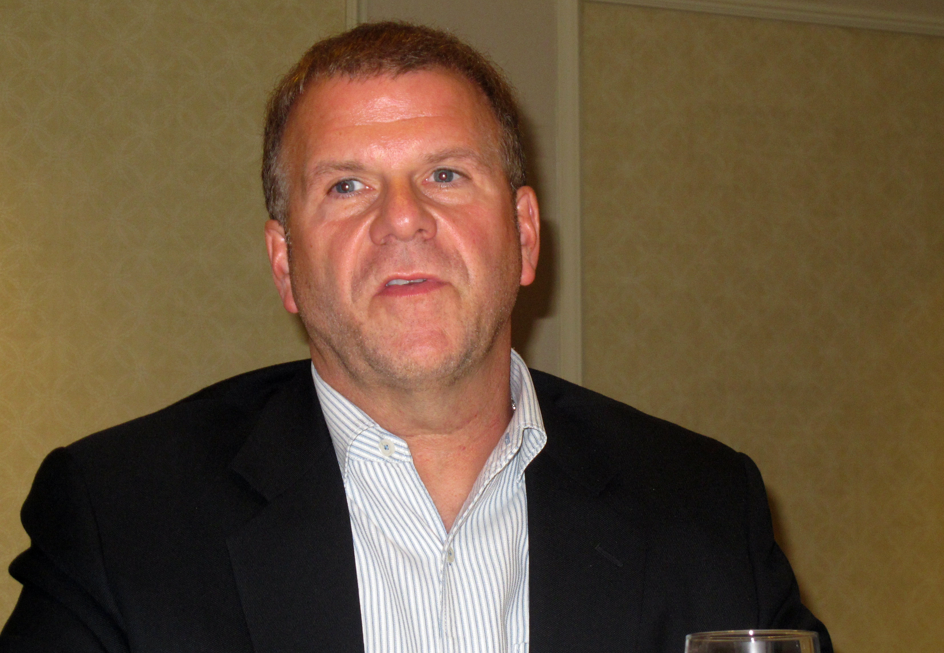 Tilman Fertitta purchased the Rockets for a record $2.2 billion.