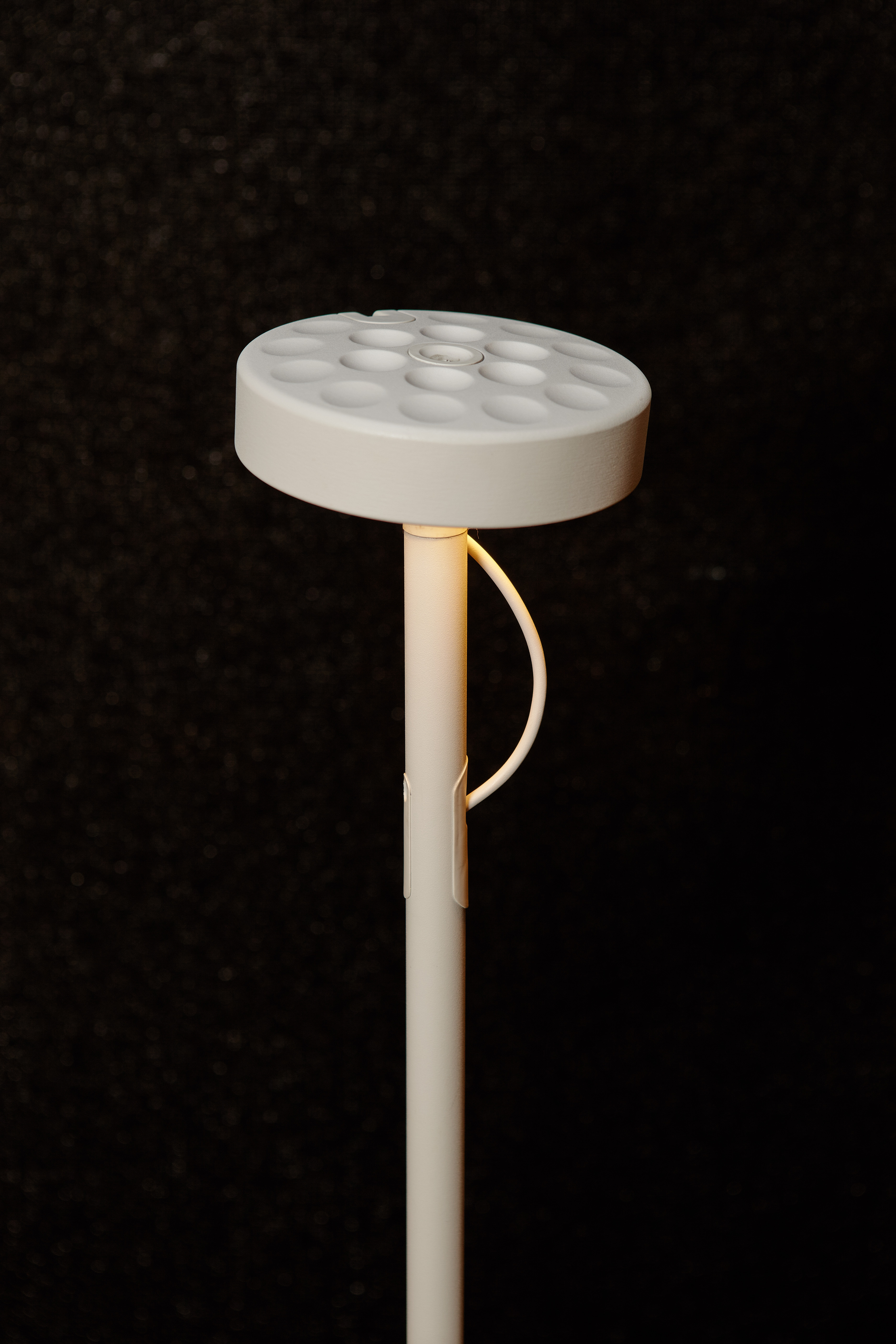 “U-Turn” lamp, designed by Michel Charlot for Belux AG.