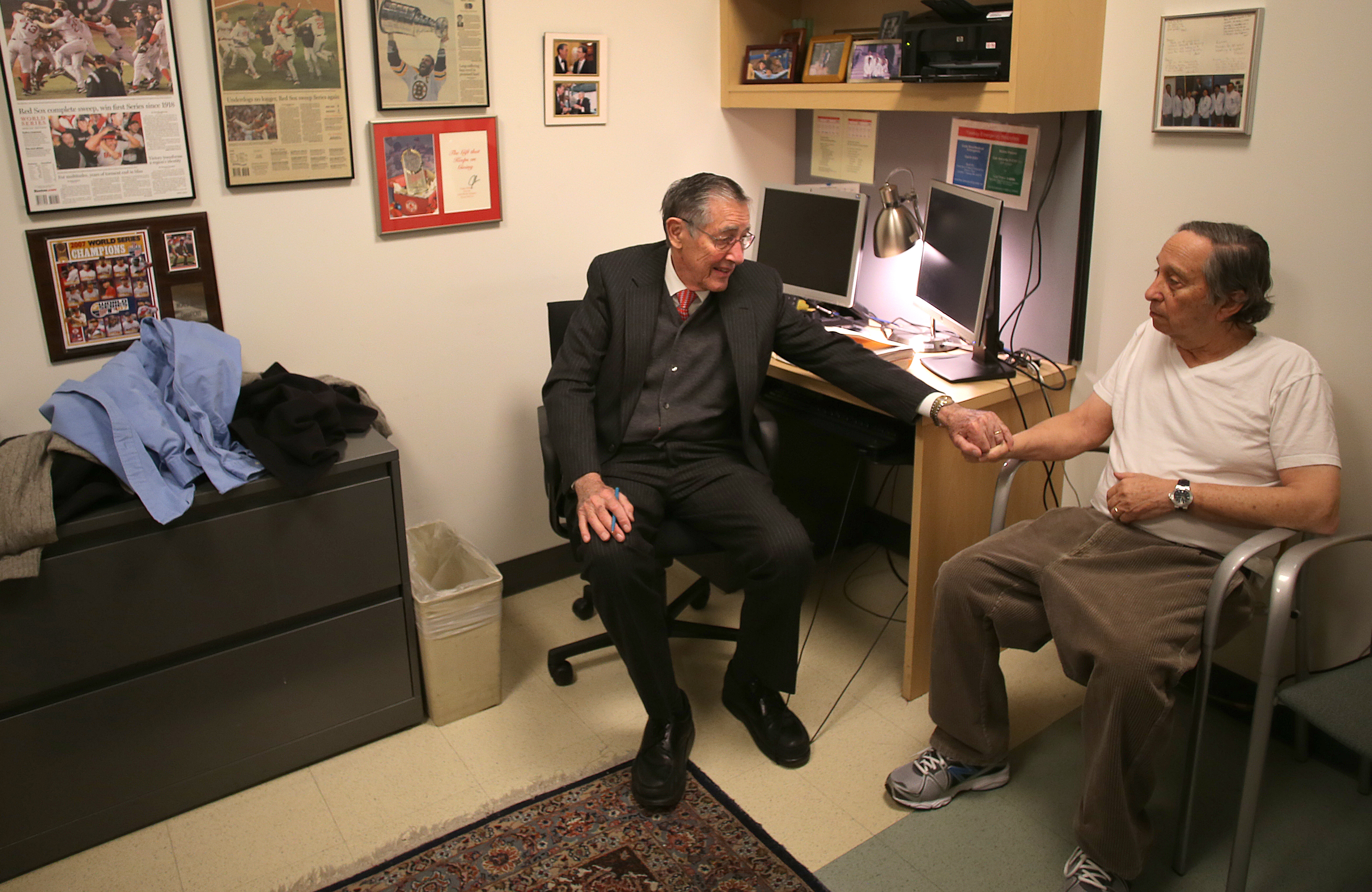 Dr. Roman DeSanctis chatted with patient Gordon Ehrlich this week. DeSanctis has never worked with a nurse in his outpatient office and takes patients’ blood pressure himself.
