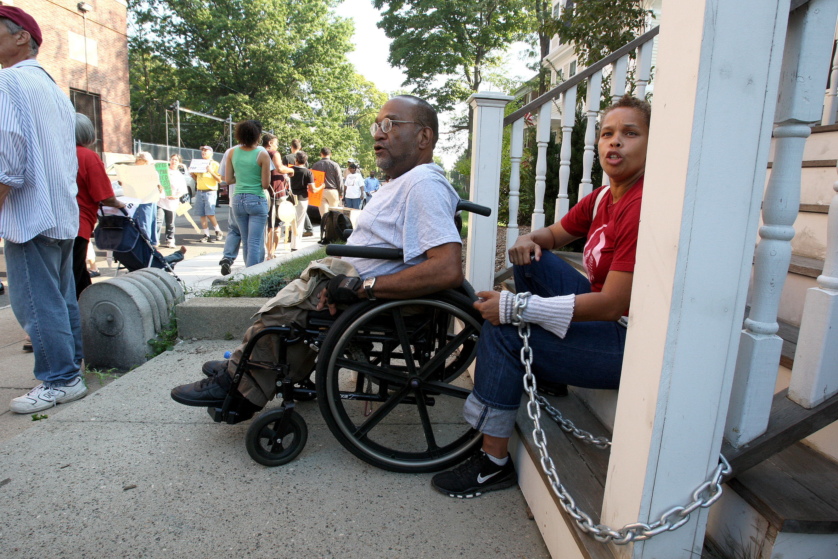 James Brooks was at another protest at that same location in September 2008. Soledad Lawrence chained herself to the stoop.
