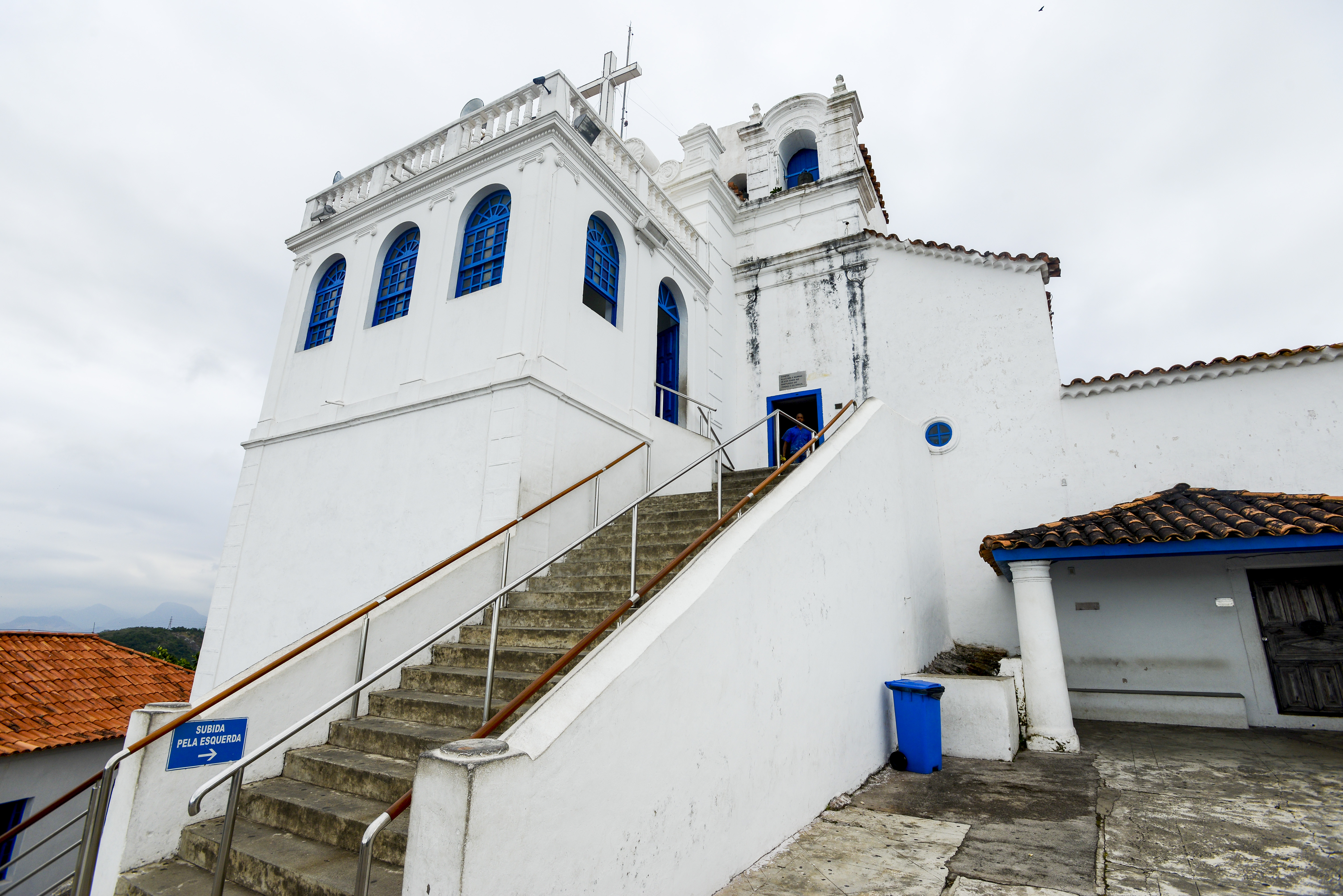 Carlos Wanzeler, out of the reach of US law in Brazil, could view a 16th-century convent on a hill overlooking Vitoria.