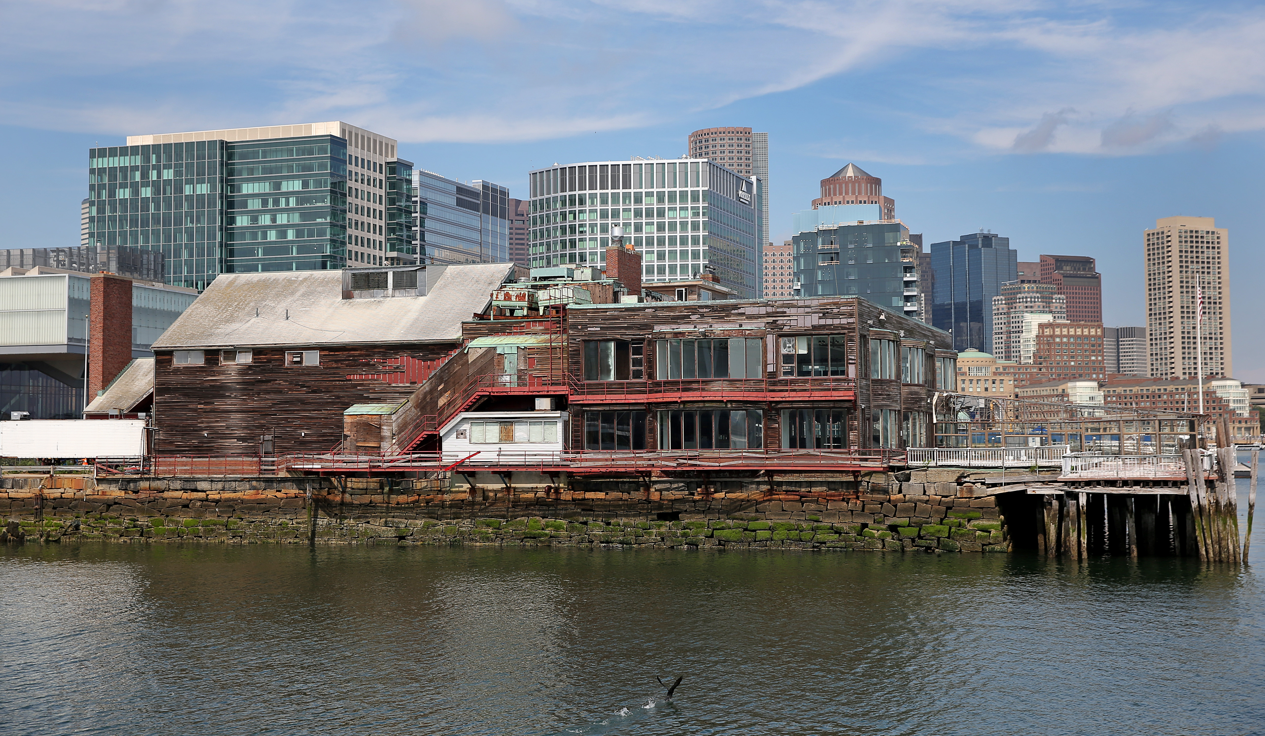 New development along the waterfront surrounds the former restaurant, which closed in 2013 and will probably be demolished next spring.