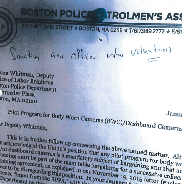 A notice posted on a bulletin inside of a Hyde Park police station by the Boston Police Patrolmen’s Association had “Sanction any officer who volunteers” scrawled across the top.