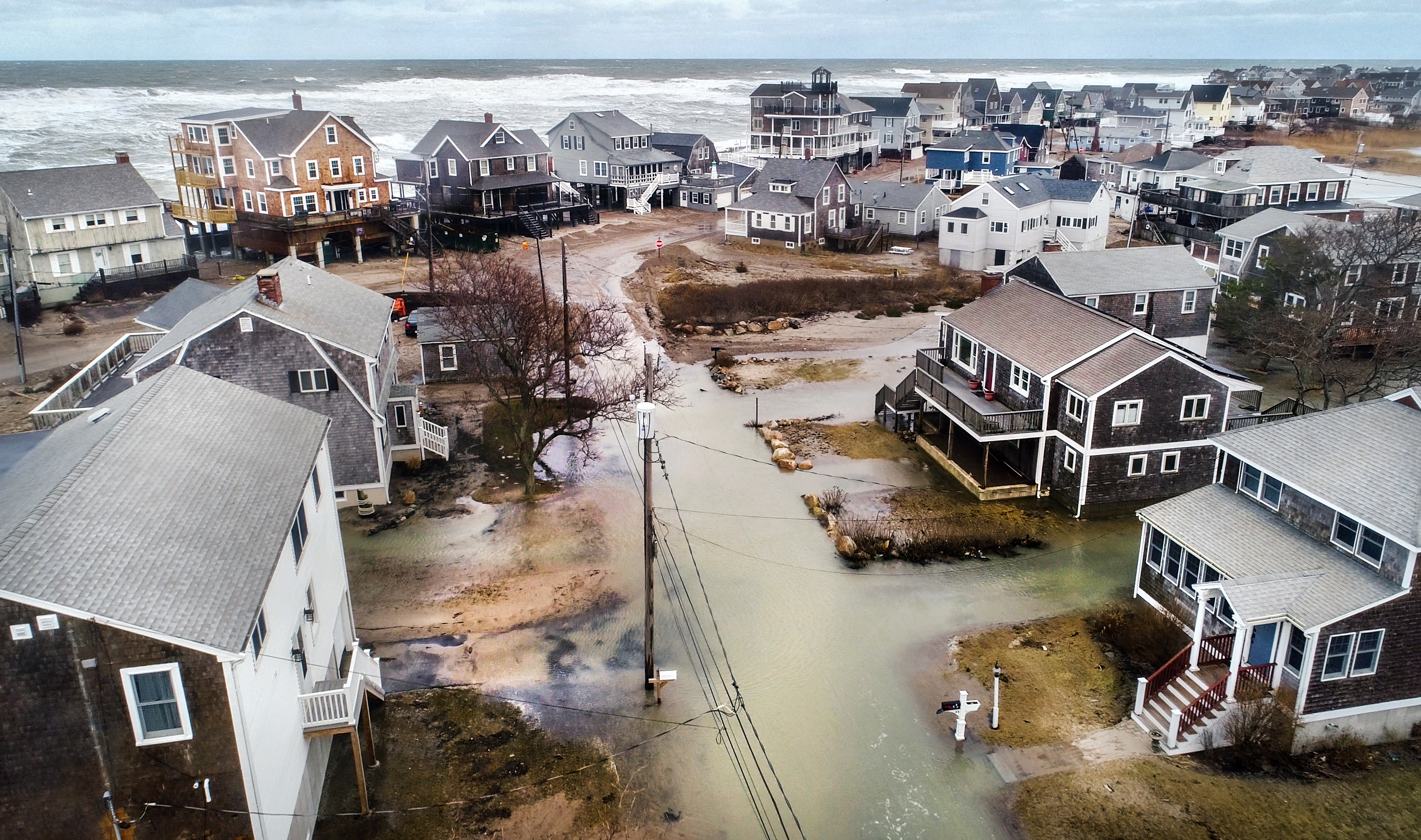 On March 5, seawater made streets impassable in this Oceanside Drive neighborhood in Scituate during high tide.