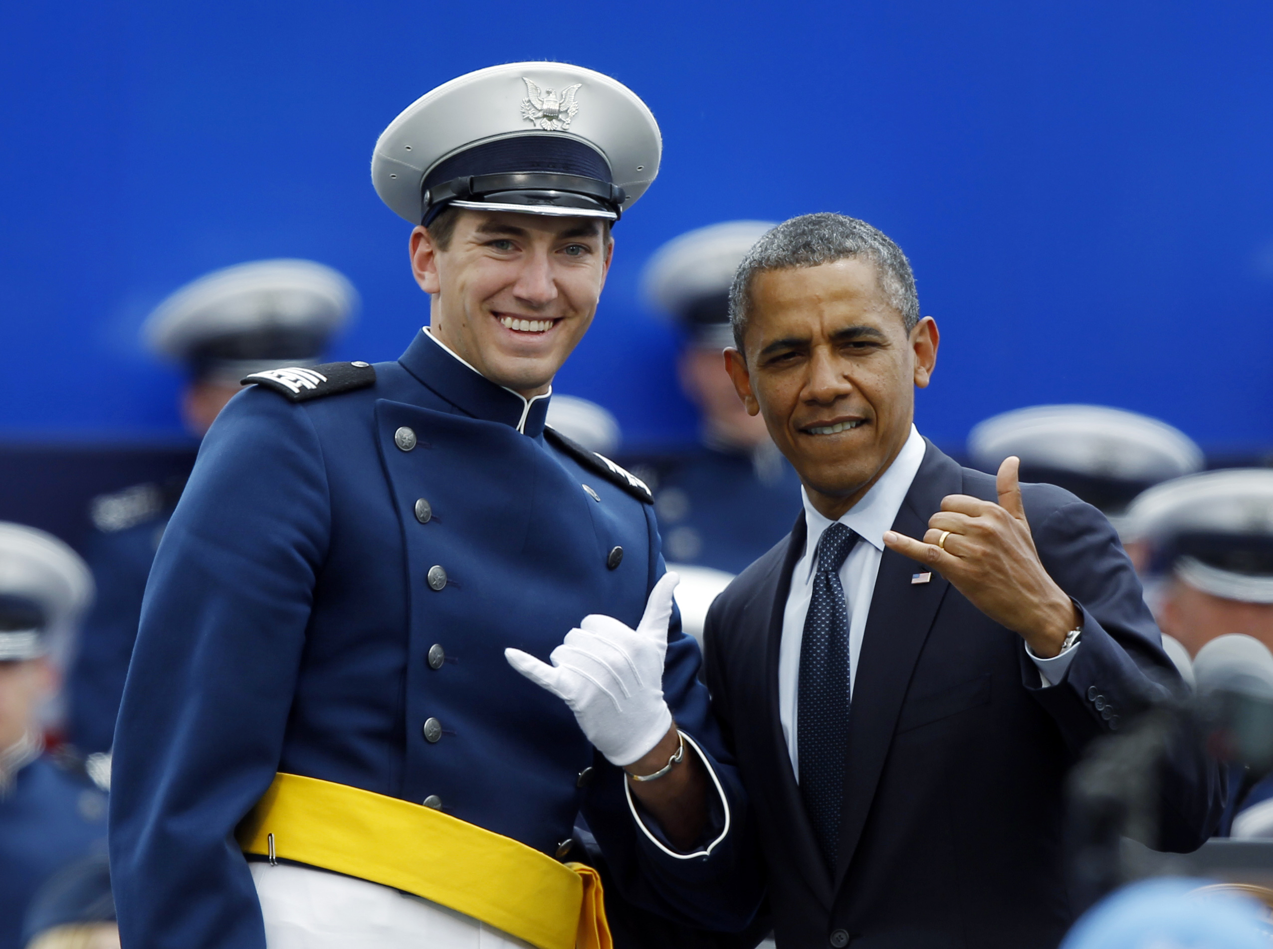 President Obama posed with an unidentified cadet during the Air Force Academy’s graduation ceremony Wednesday.