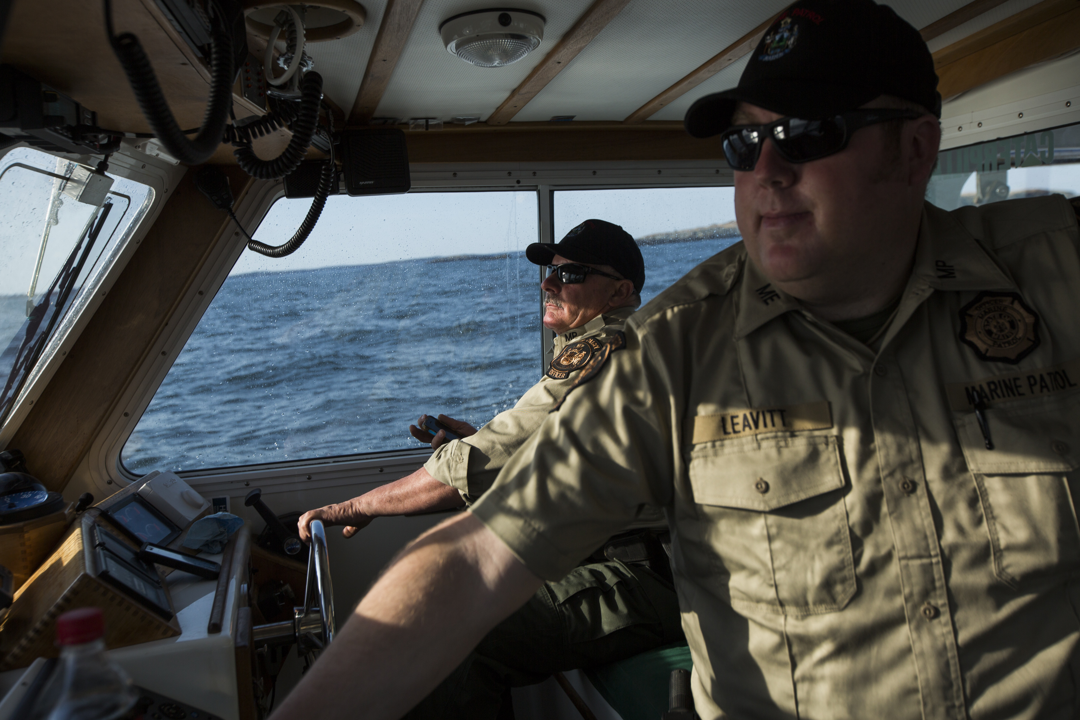 Maine Marine Patrol specialist Mark Murray, left, and officer Jason Leavitt patroled the waters near the Machias Seal Island on May 7.