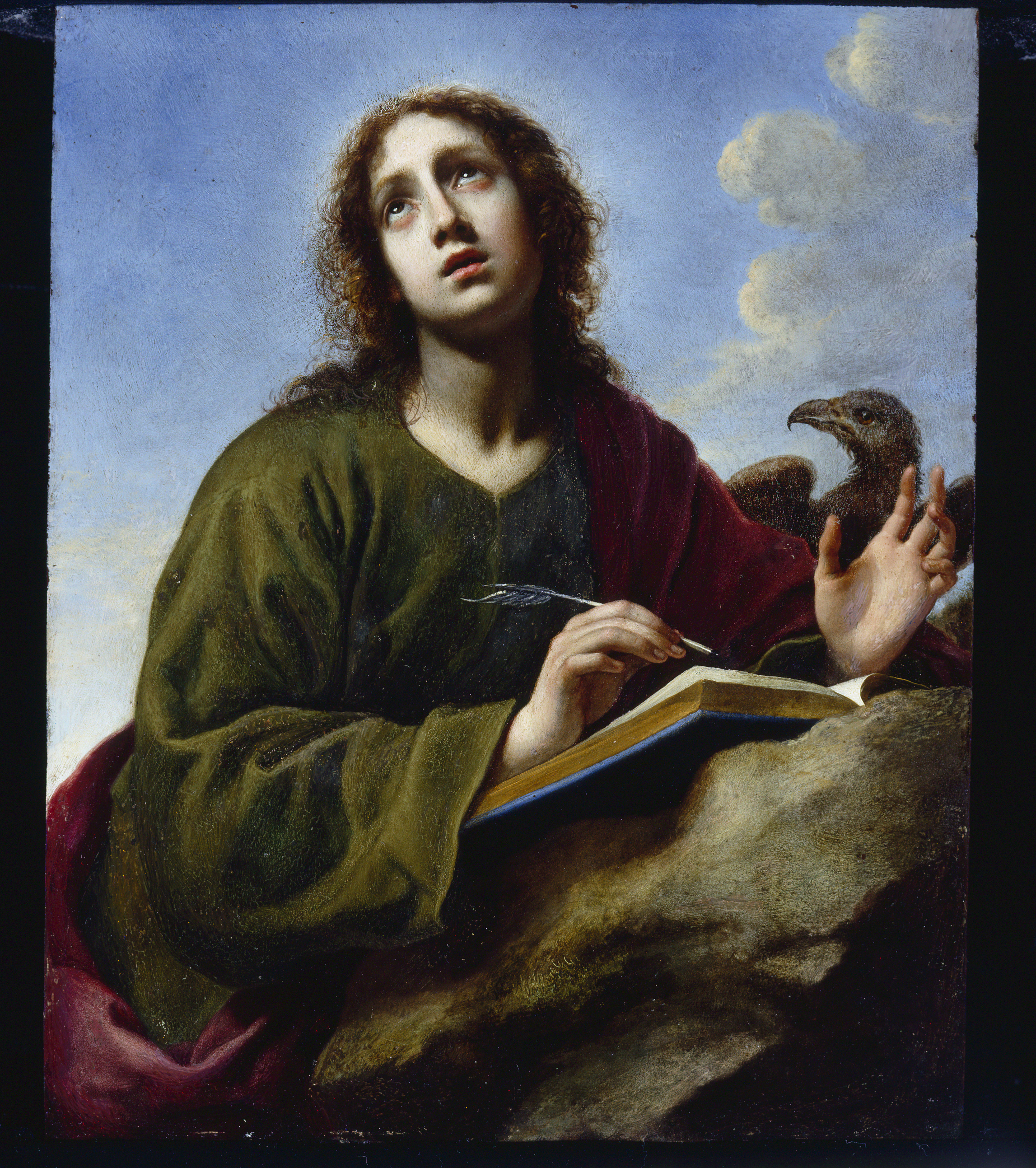 Carlo Dolci’s “Saint John the Evangelist Writing the Book of Revelation.”