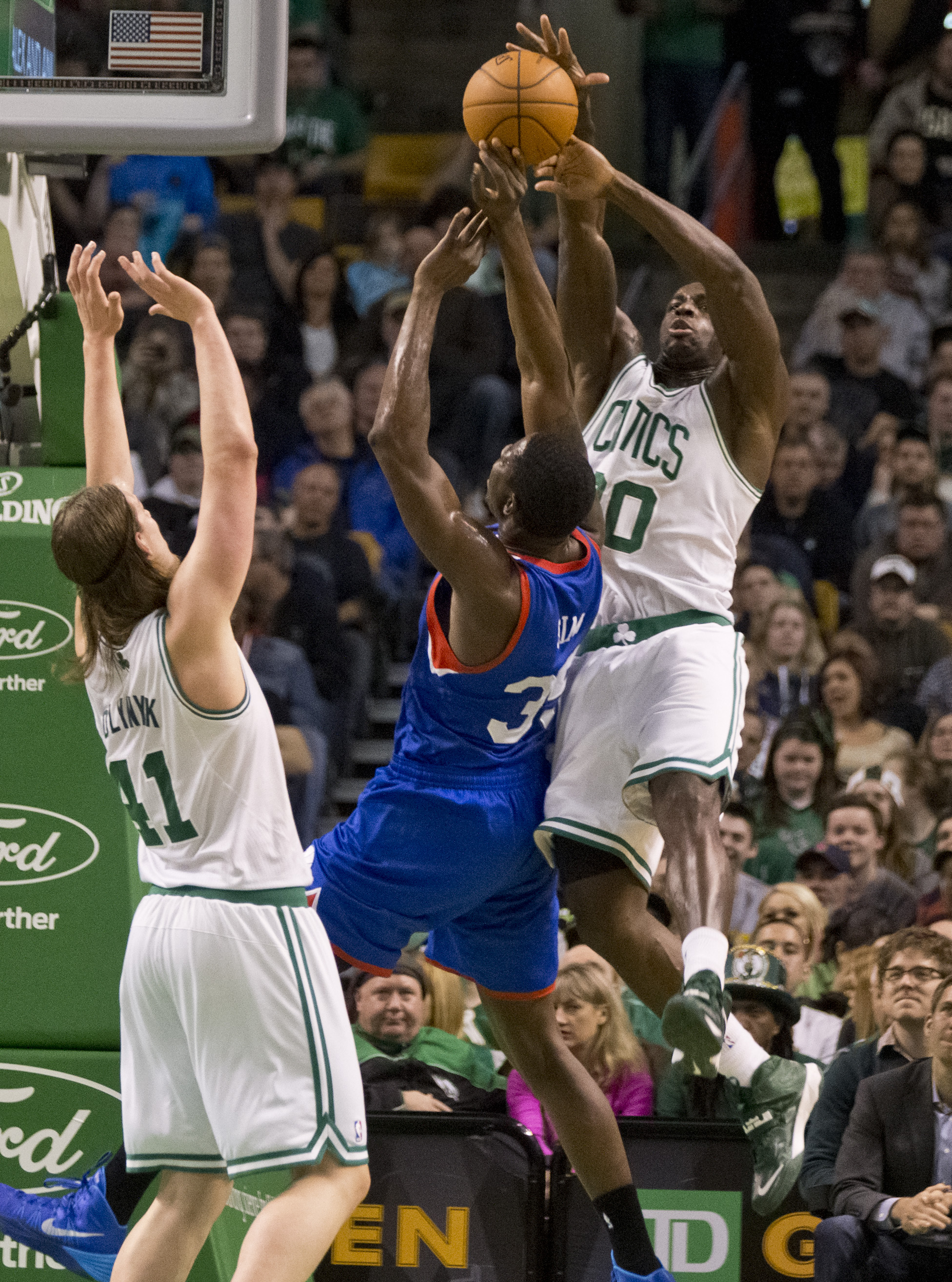 Brandon Bass put defensive pressure on Henry Sims in the second period.