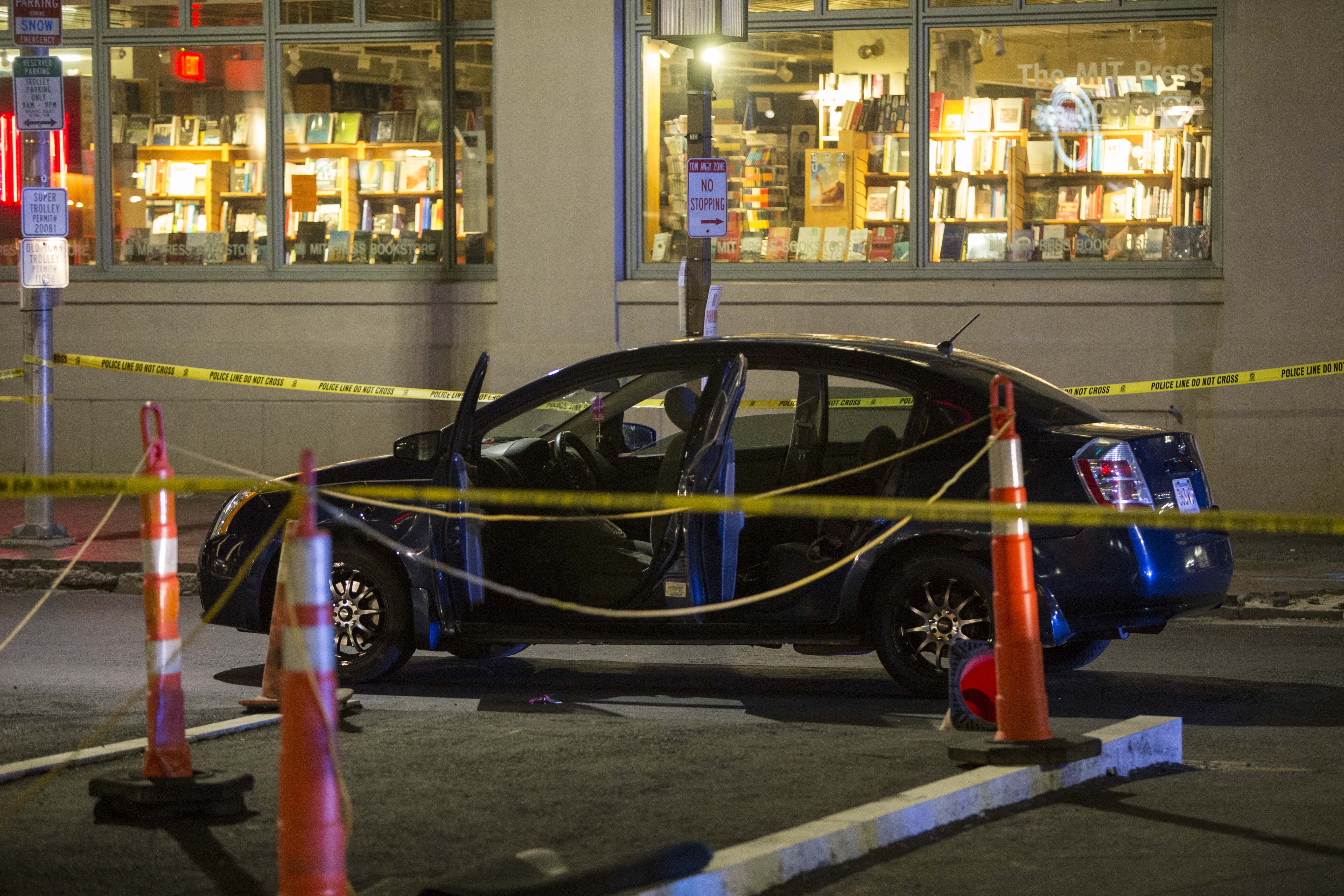 Crime scene tape surrounded the car in which Rasaun Nichols was killed Aug. 12.