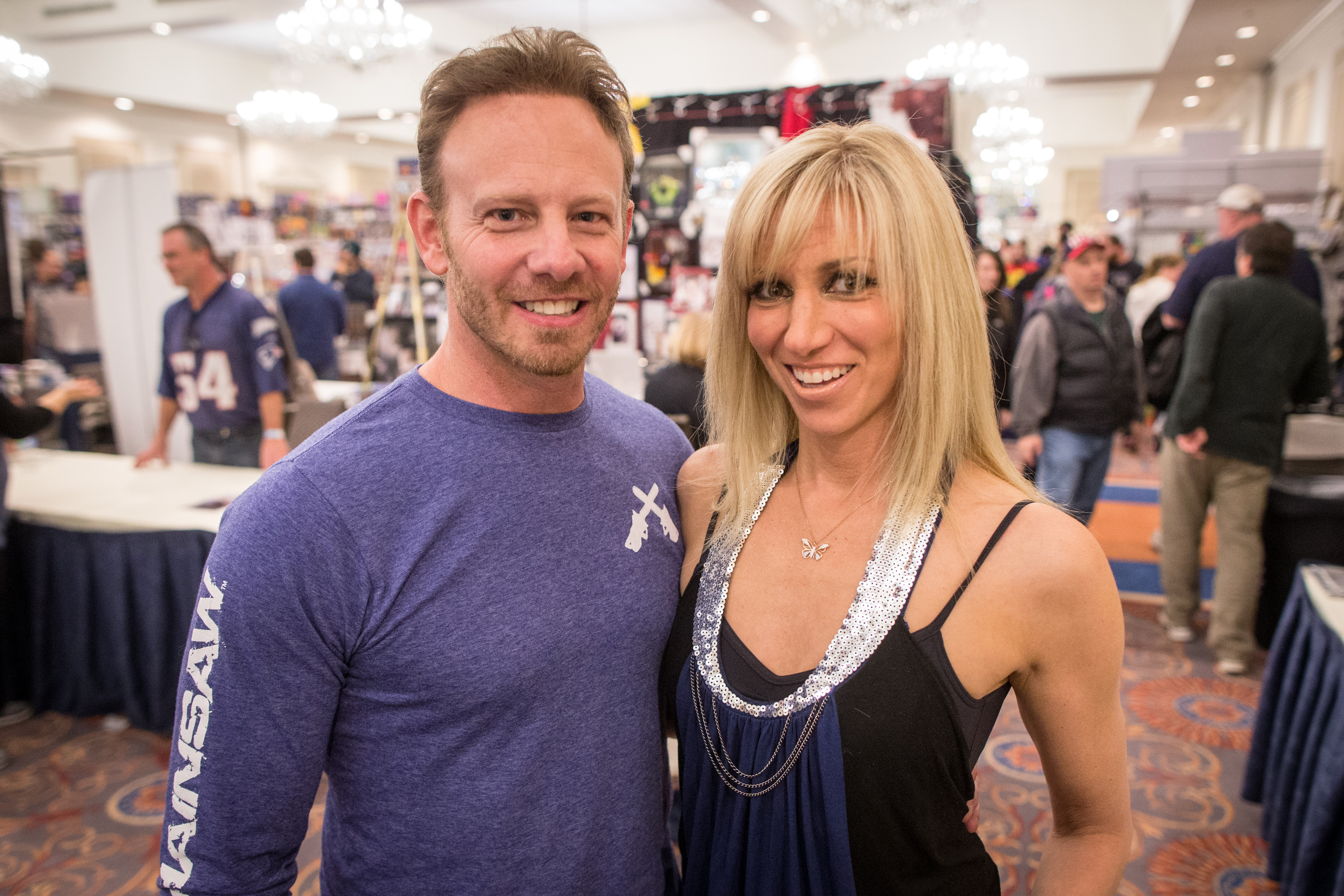 Ian Ziering and Debbie Gibson posed at Super Megafest at the Sheraton Framingham over the weekend. Below: Aileen Quinn (left), her movie poster behind her, greets a fan, Teresa Pellom of Georgia.
