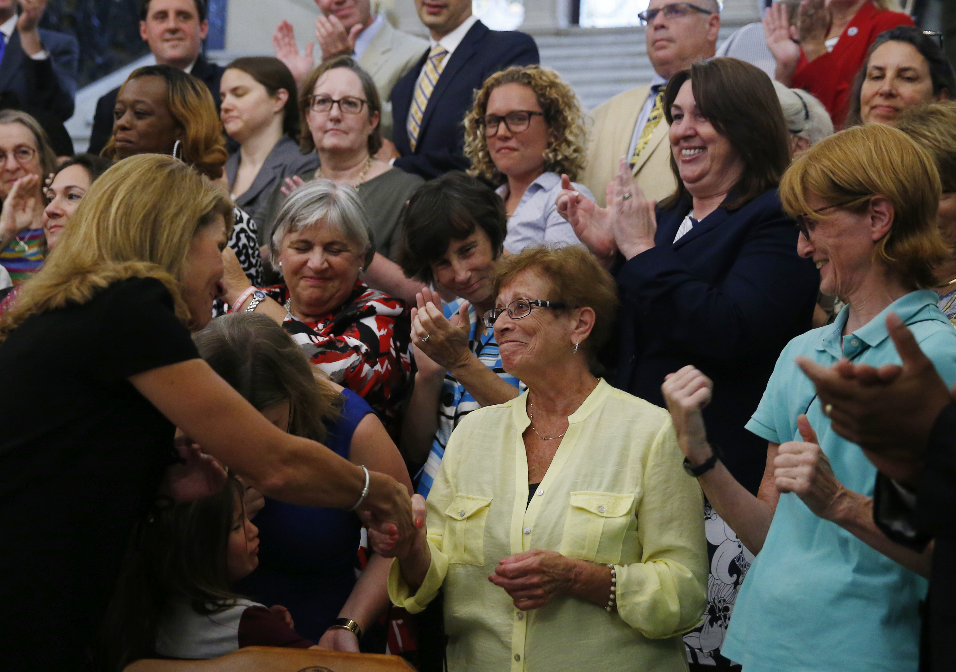 Lieutenant Governor Karyn Polito shook hands with Dorothy Simonelli Monday at the State House.