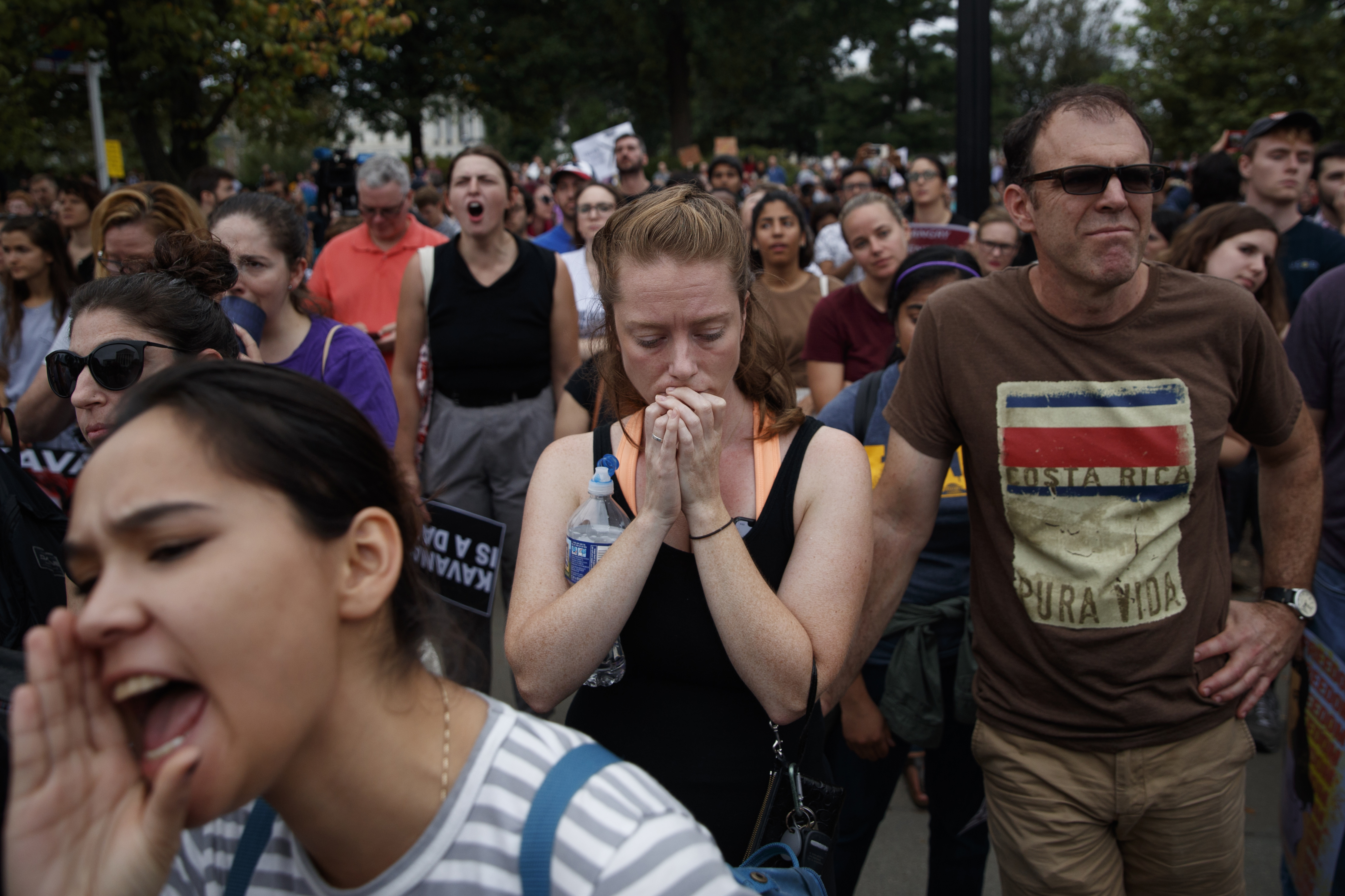 Demonstrators reacted to the news of the confirmation of Judge Brett Kavanaugh to the Supreme Court in Washington on Saturday.