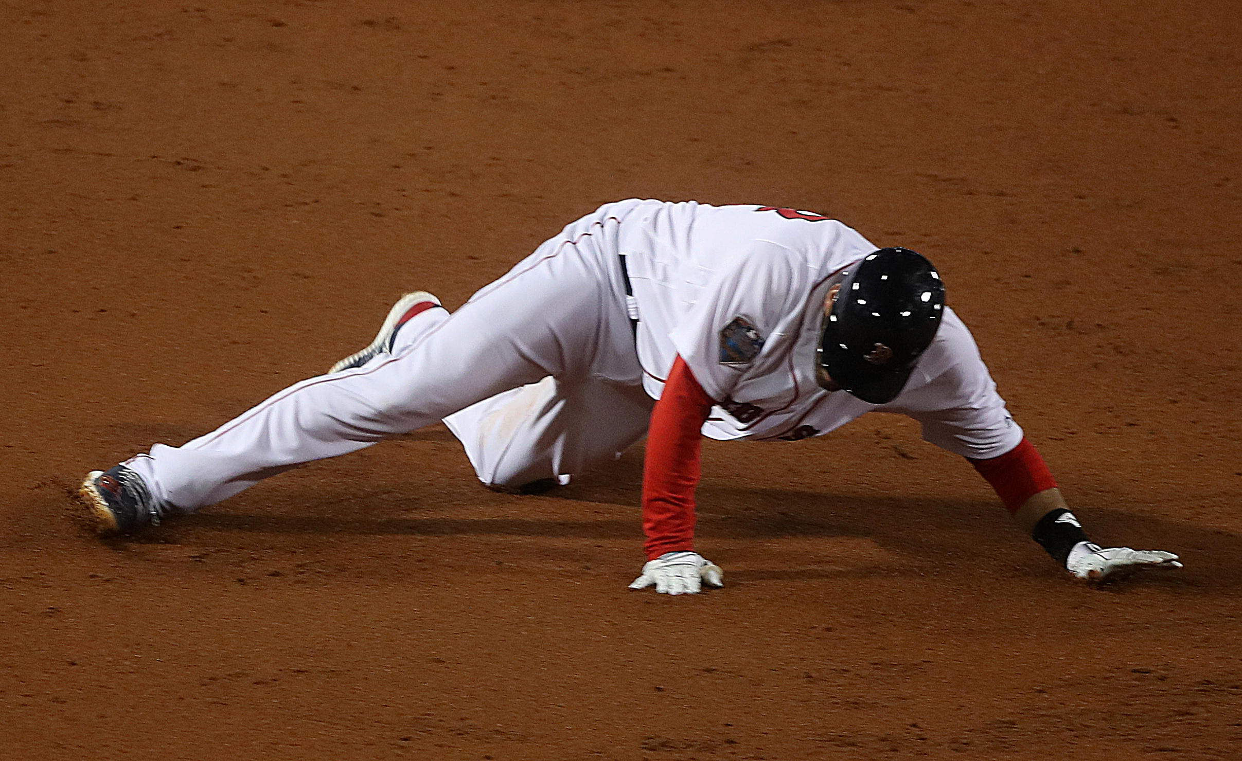 J.D. Martinez slipped while running the bases after his double in the third.