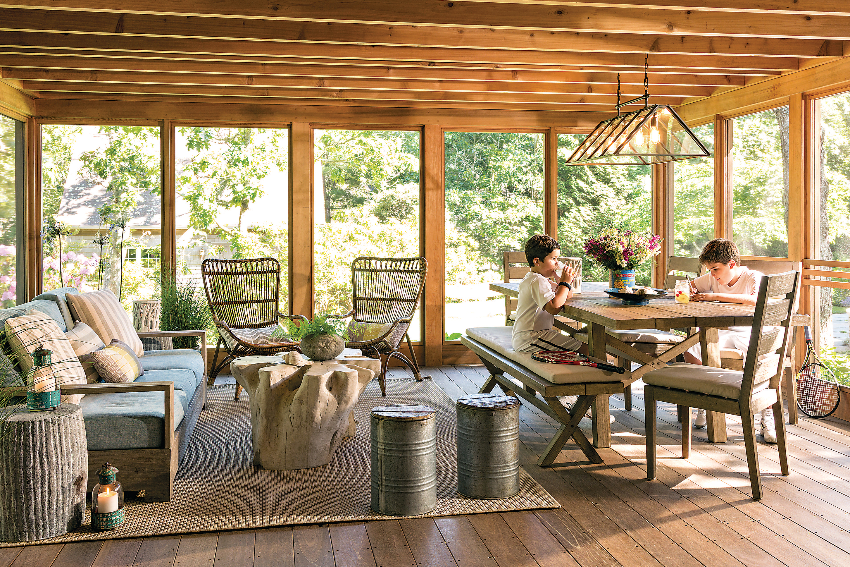 The doors from the main house to the porch retract and stack on one another, essentially doubling the size of the living space.