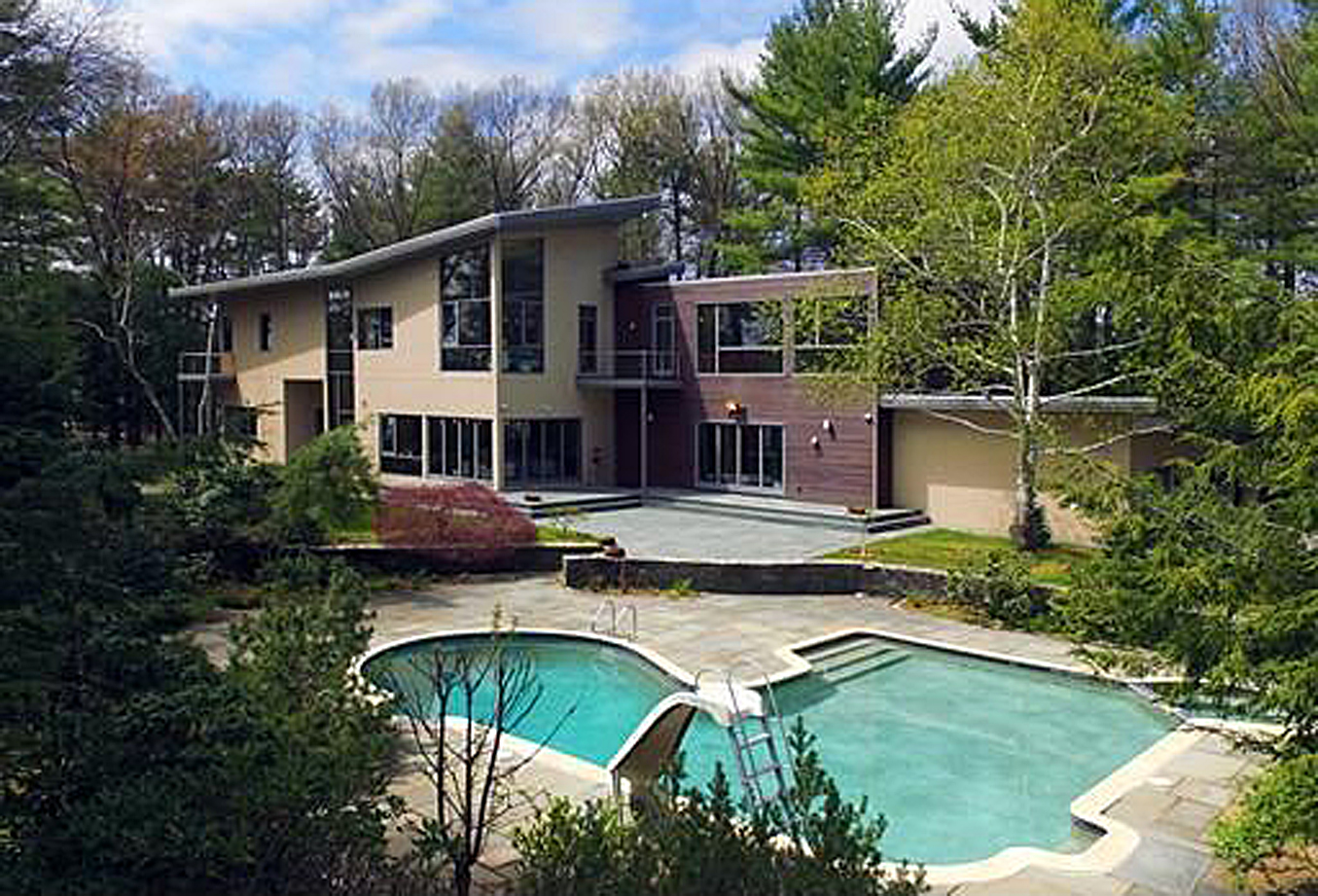 The house at 8 Needham Road, where a person was fatally shot Sunday during a party.