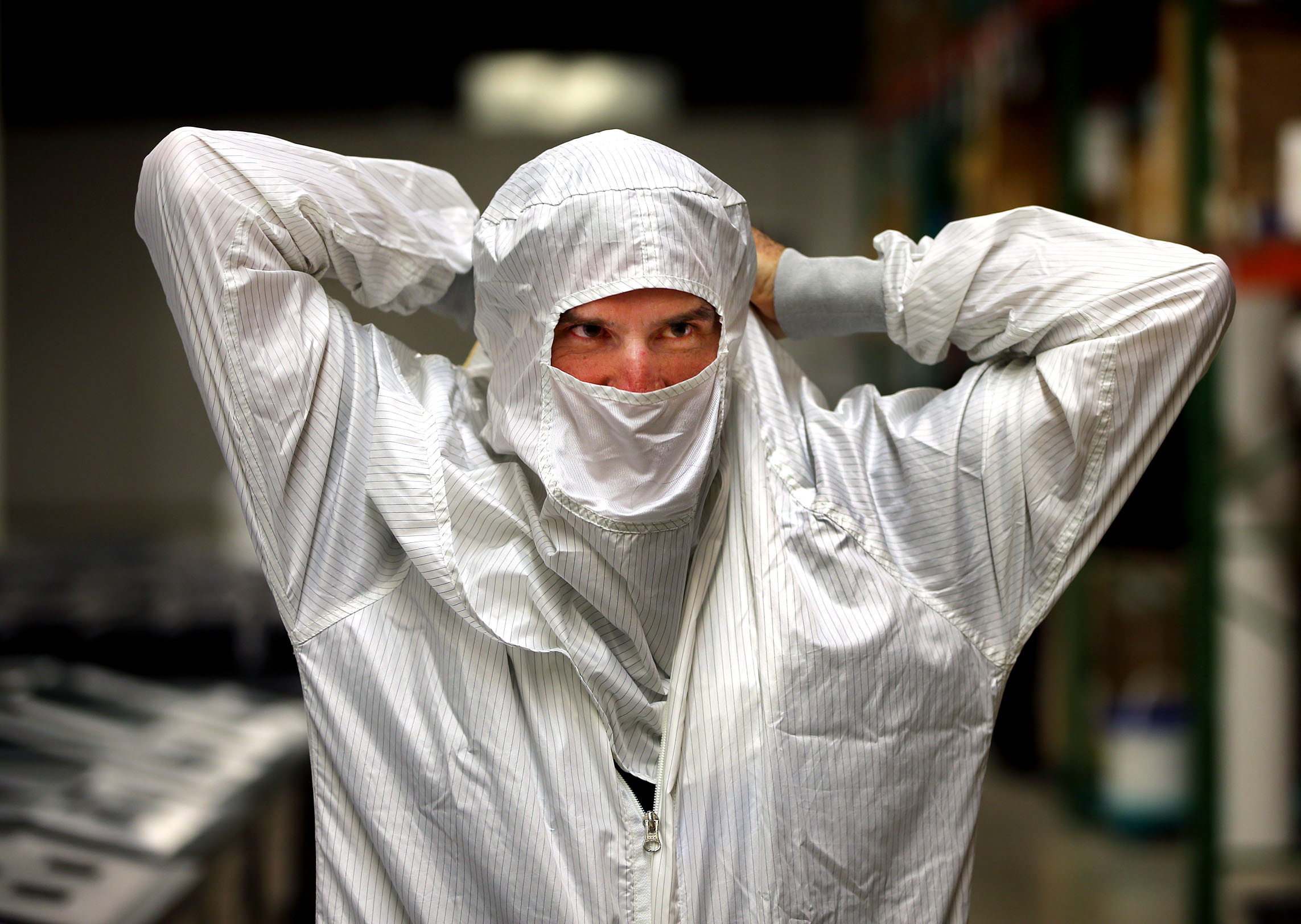 Organogenesis players include Mike Joyce, who suited up in a clean room suit to enter a sterile lab at the Canton company.