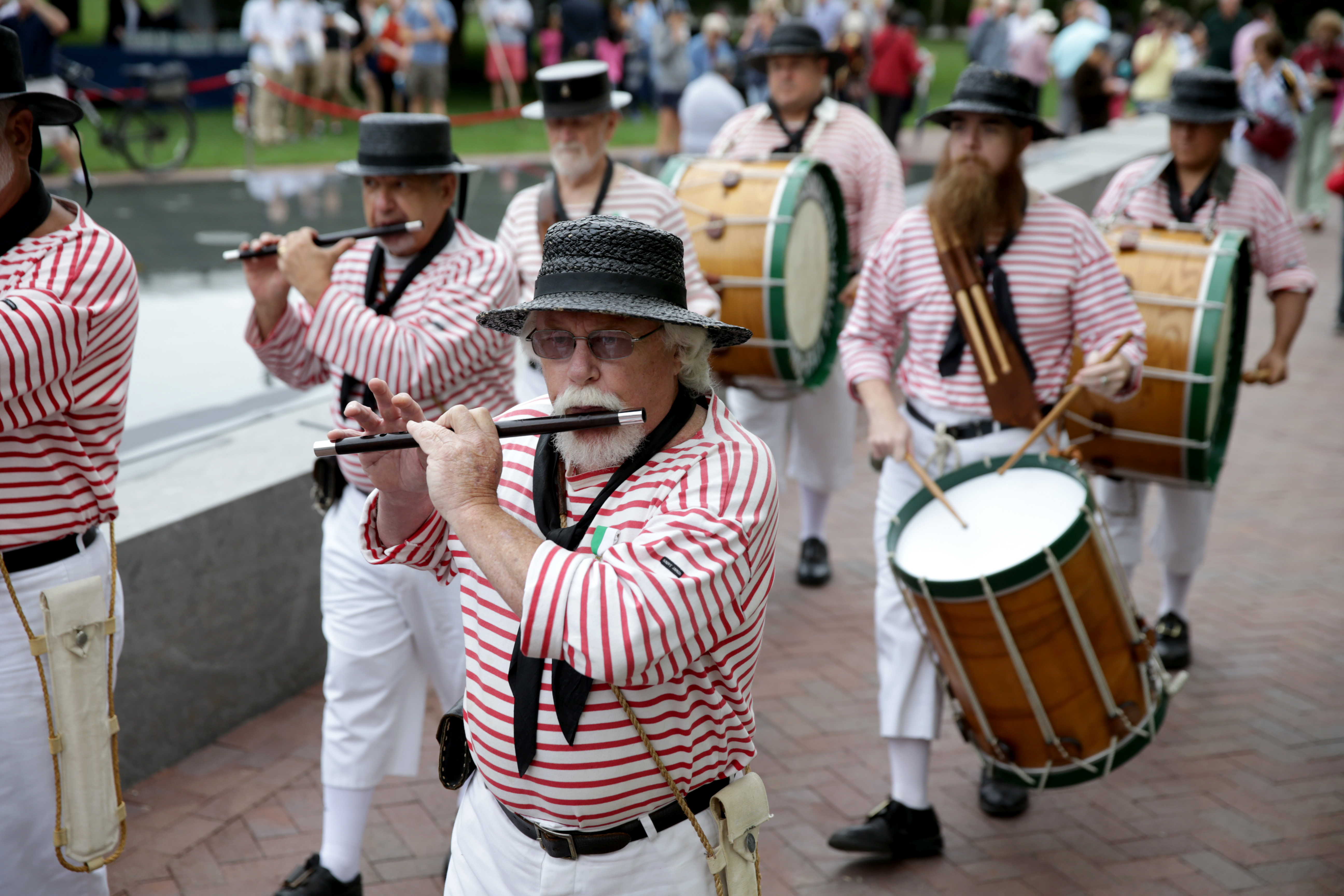 A traditional fife and drum band marched through the new Hancock-Adams Common on Saturday.