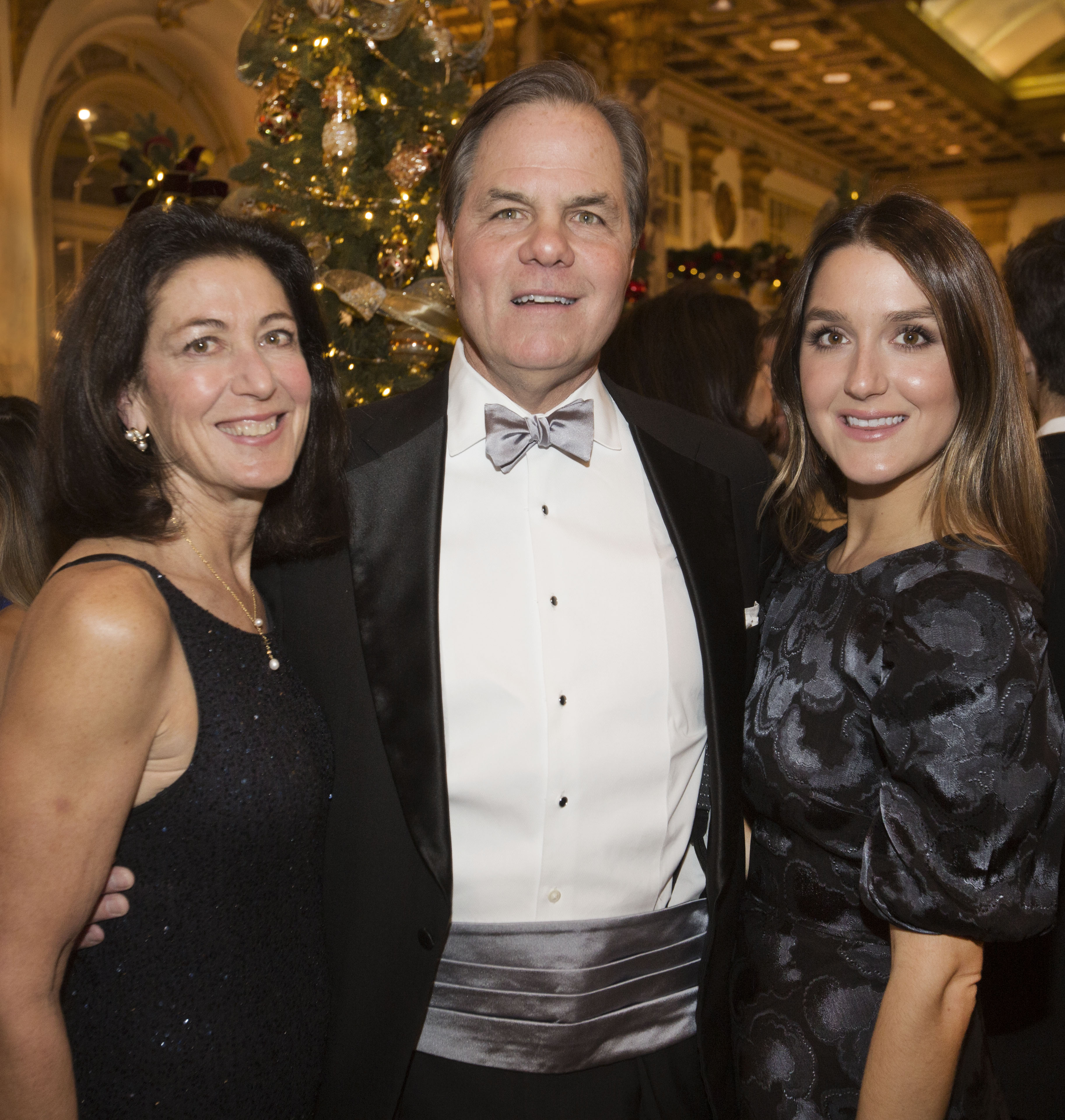 Pictured at the 2019 Mistletoe Ball (from left) are Stephanie Andrews and her husband, Marc White, and their daughter Marina White.