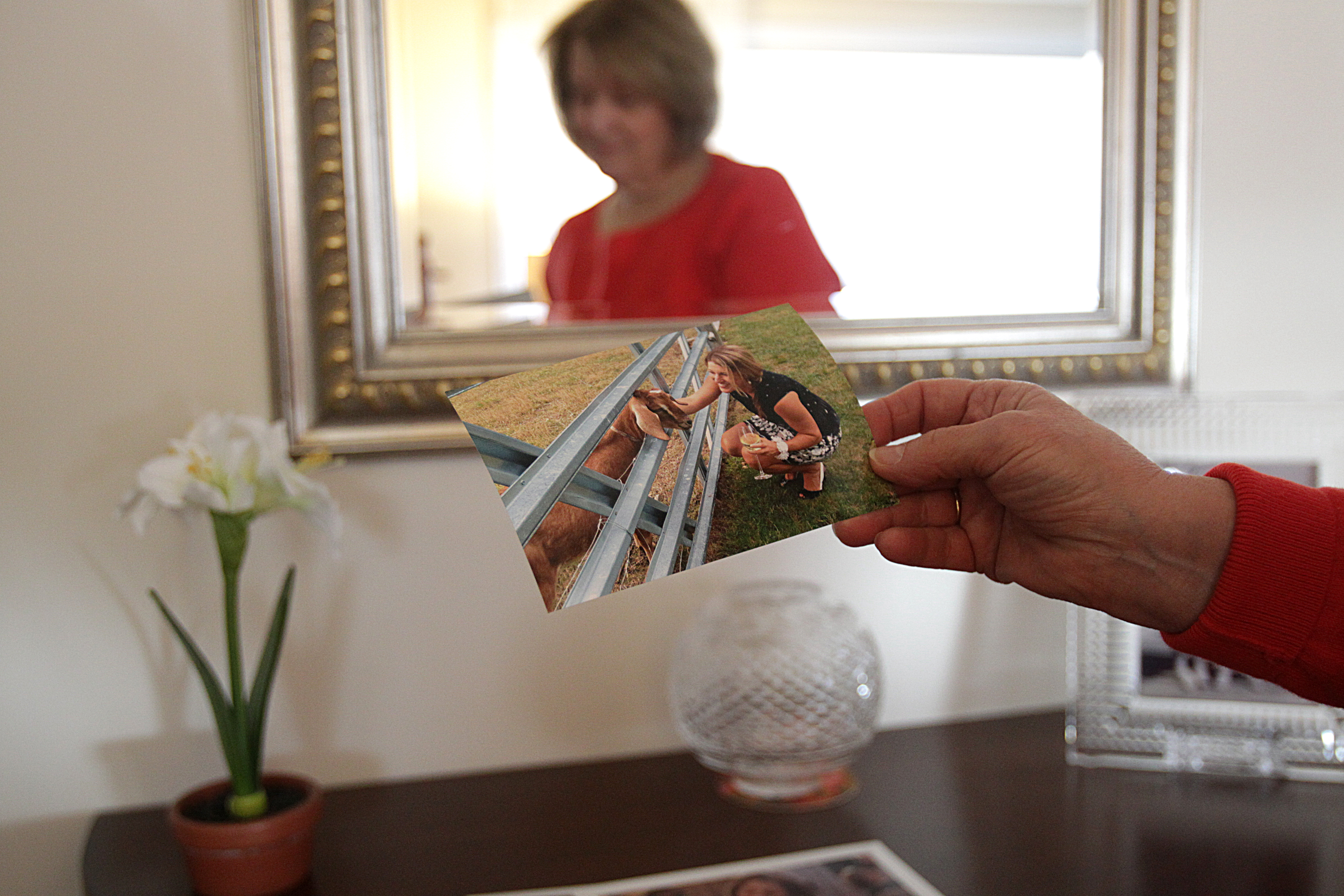 Louanne Clavette, the mother of Caitlin Clavette held one of her favorite photographs of her daughter.