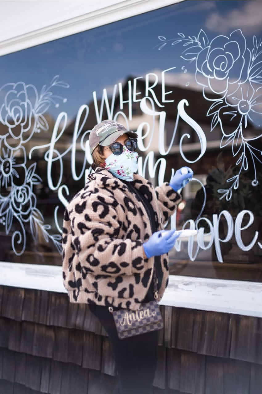 Antea Amoroso started decorating store windows for free in April.