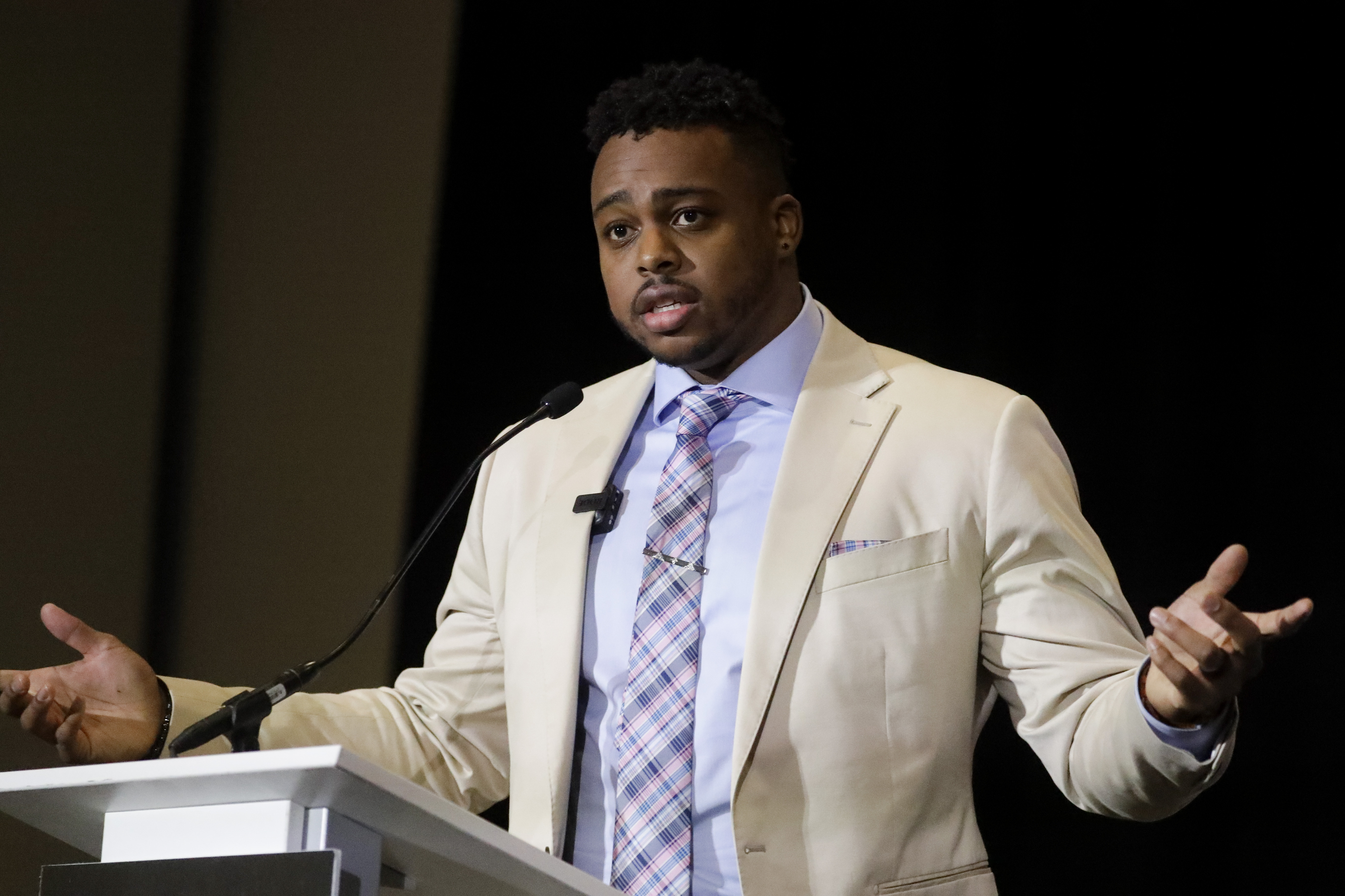 Brandon Copeland speaks after winning the Allen Page Community Award at the NFL Players Association annual state of the union news conference in January.