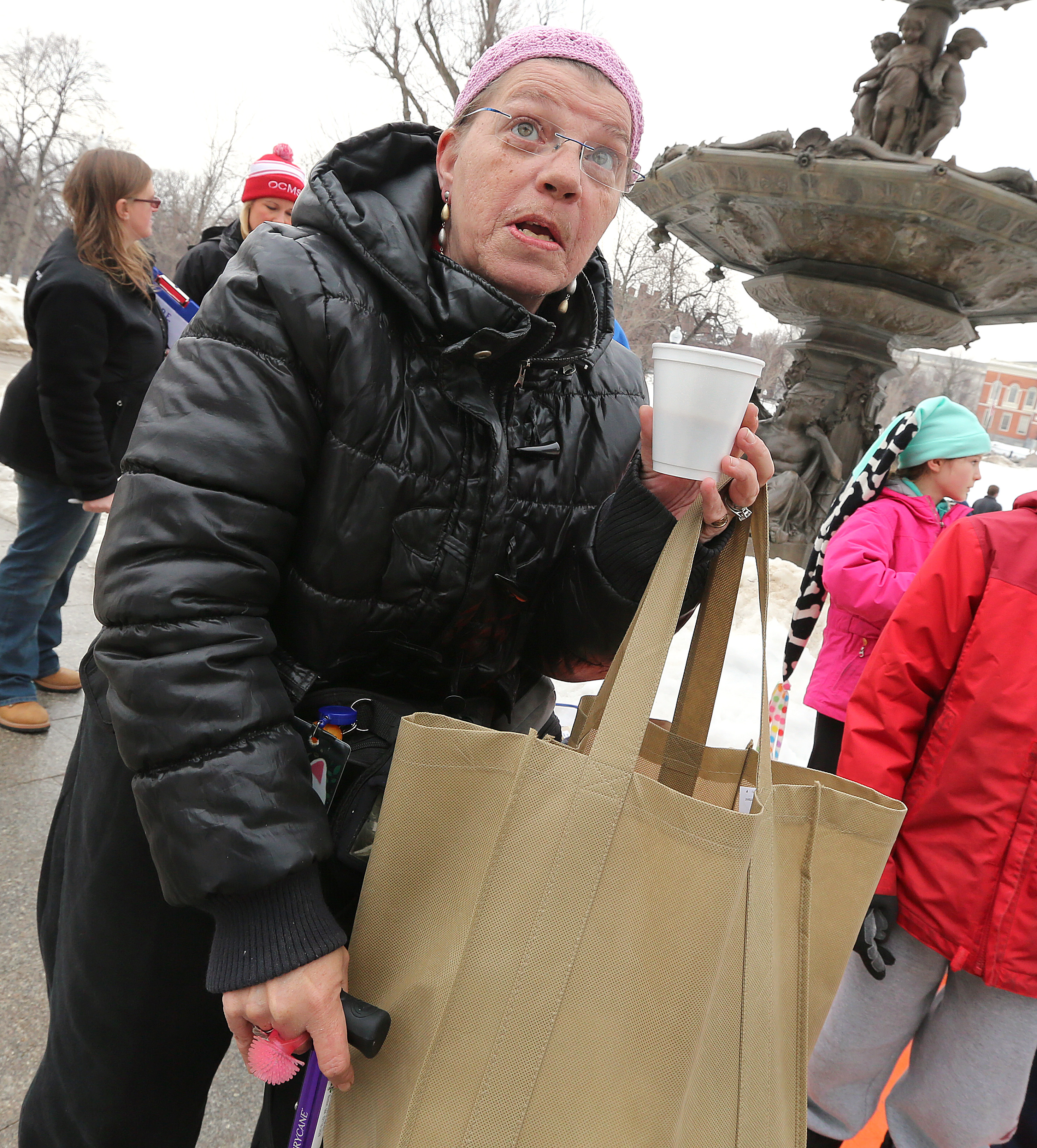 Judah Snyder received a bag of items distributed by COPE volunteers on the Boston Common earlier this month.