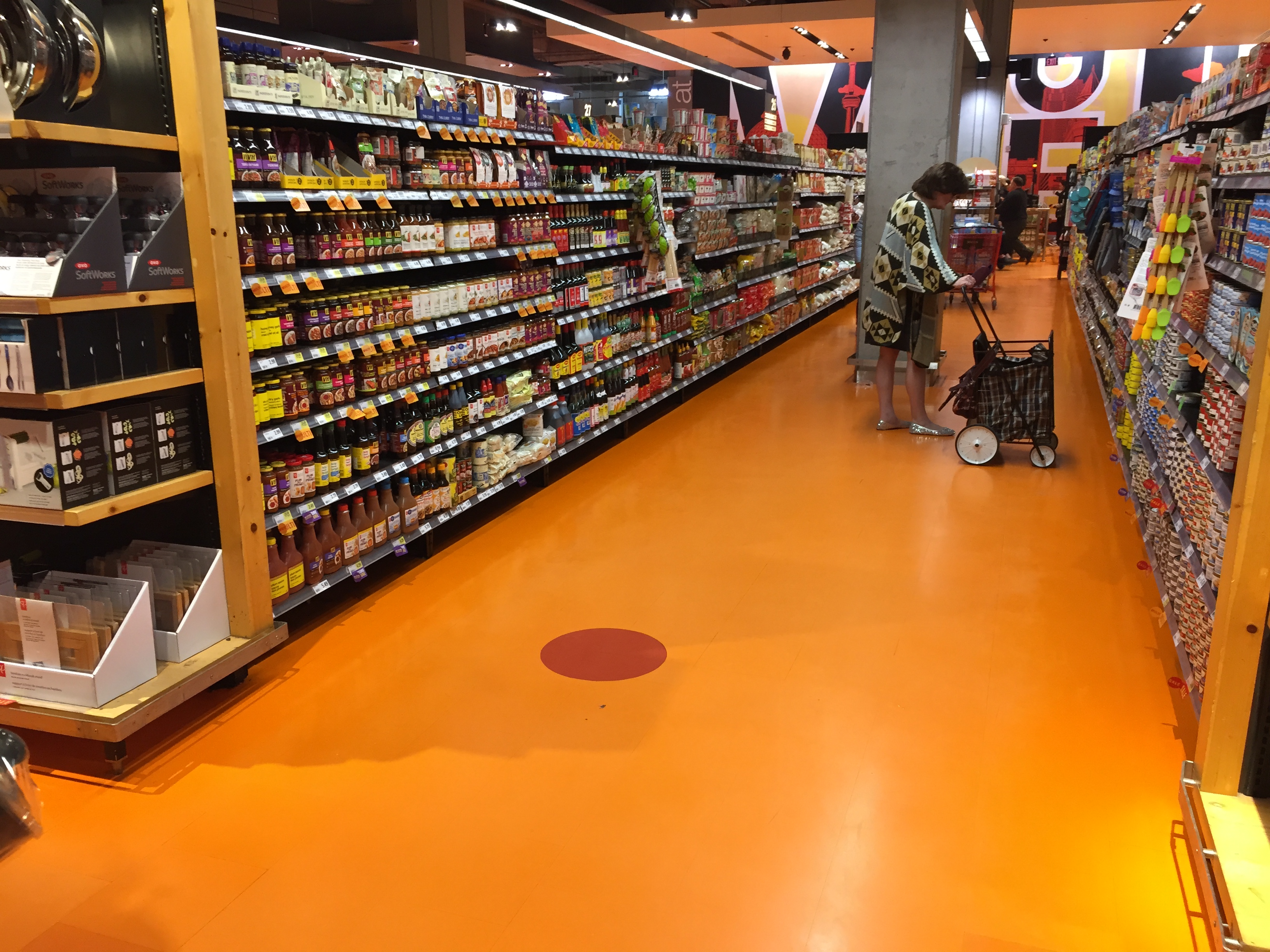 This red dot in a Loblaws supermarket in Toronto marks the spot of the former center ice faceoff circle at Maple Leaf Gardens.