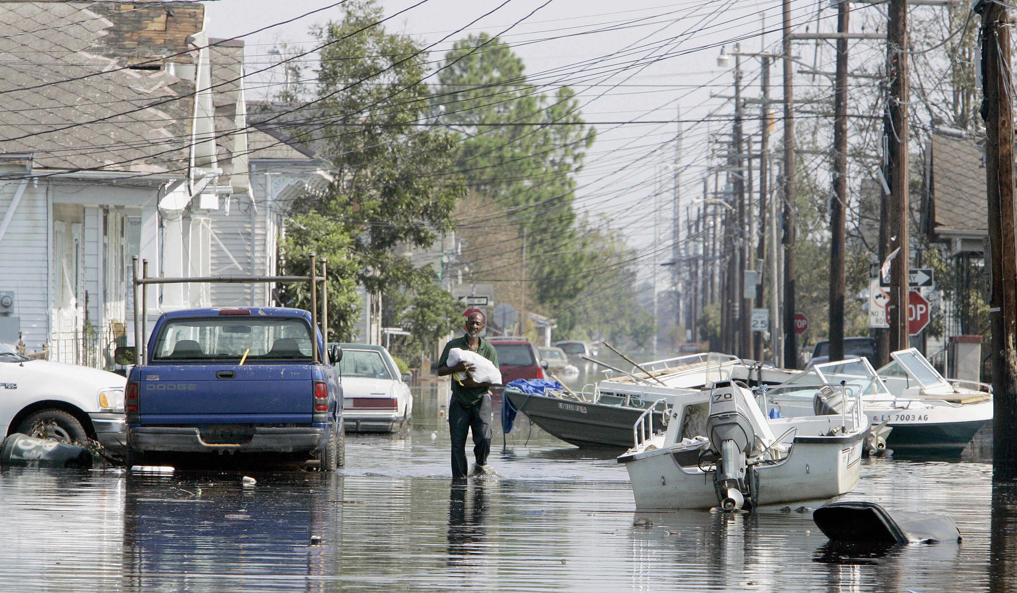 A man waded in the 7th Ward of New Orleans on Sept. 4, 2005.