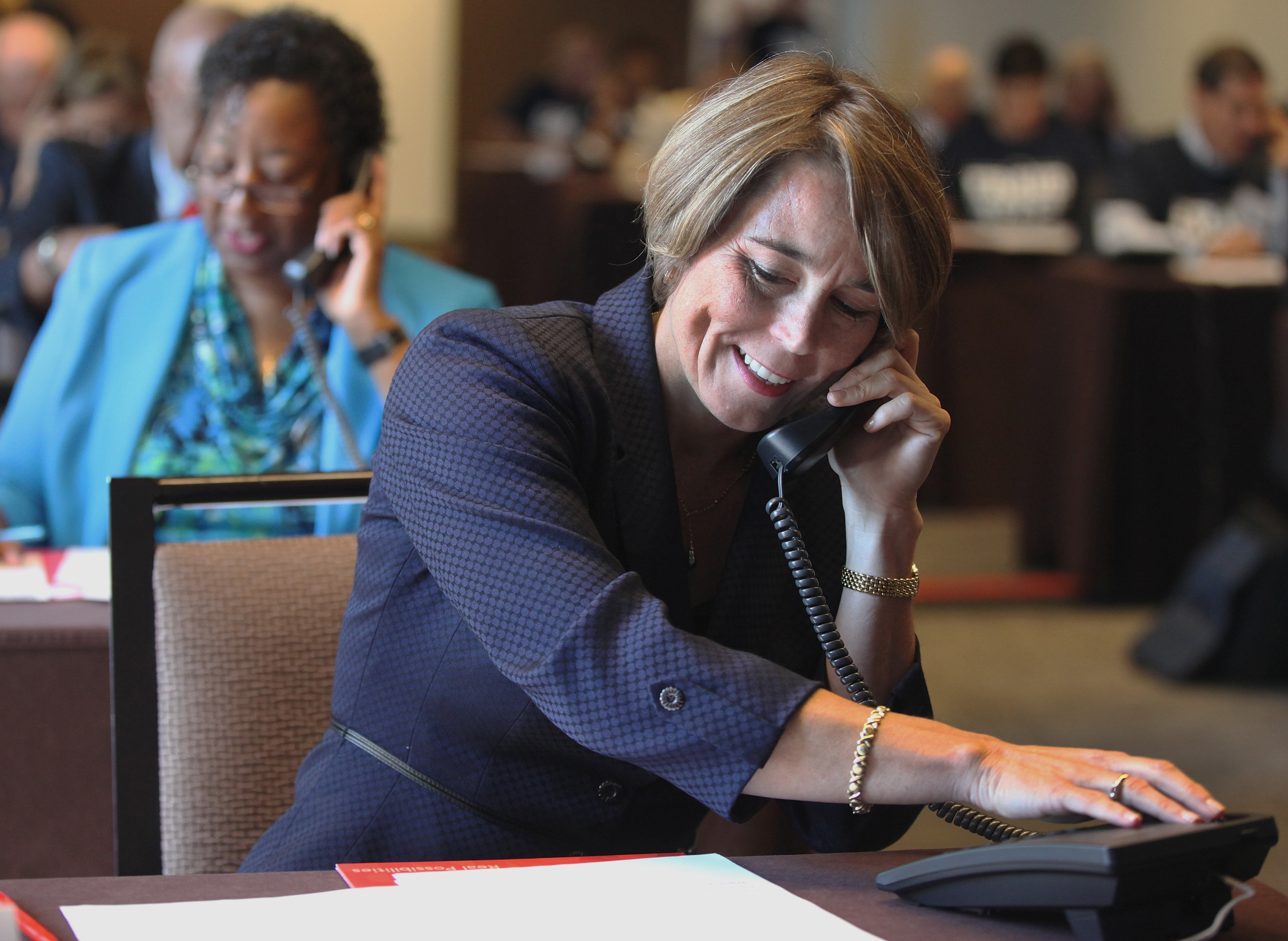 Healey made phone calls to seniors during the AARP Fraud Watch event in Boston.