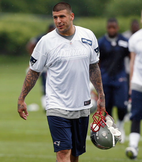 New England Patriots tight end Aaron Hernandez is shown on the field during practice in Foxborough last month. He is currently rehabbing from shoulder surgery.