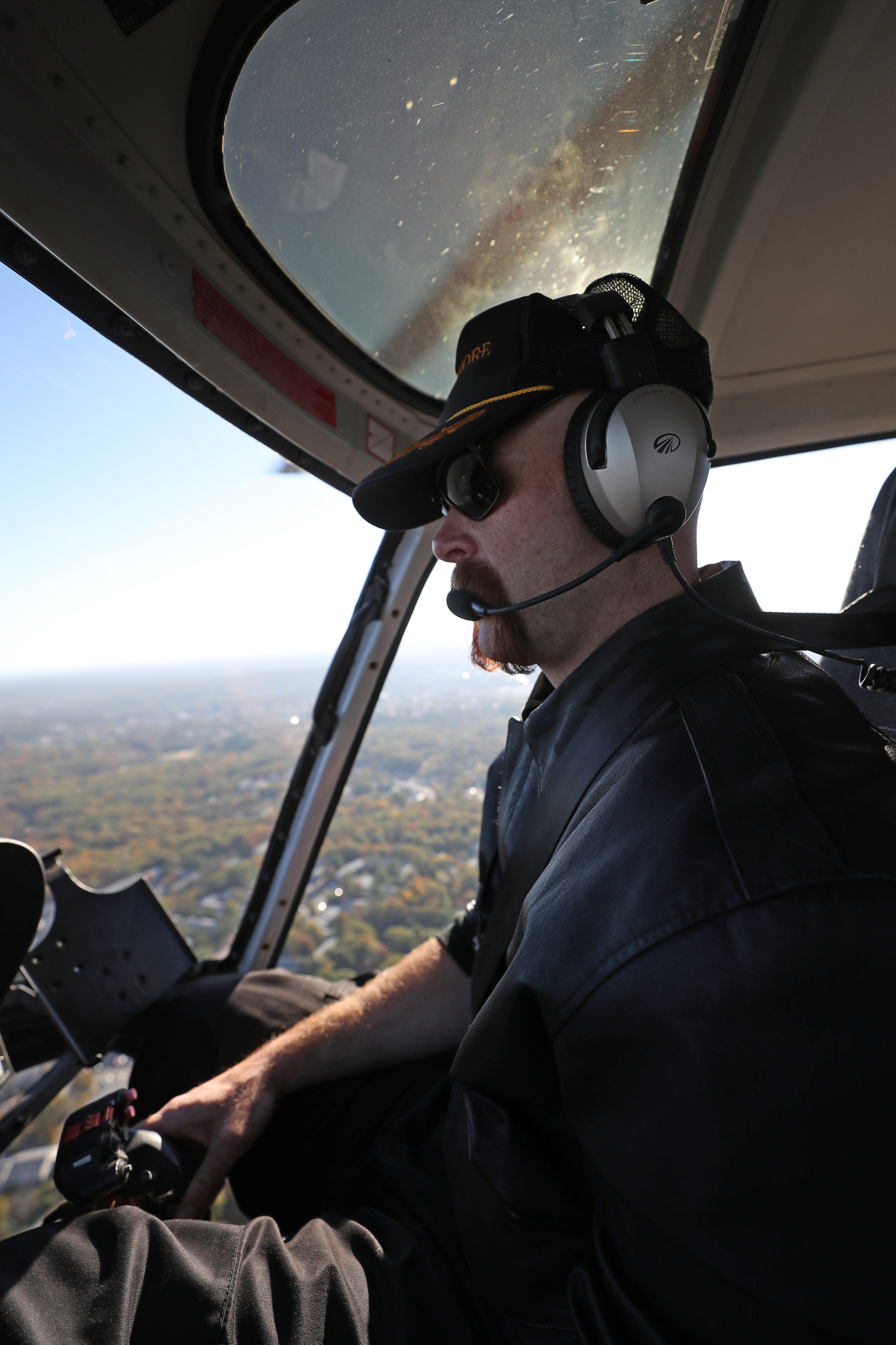 Pilot Jeff Hubbard at the controls aboard a Hover Boston flight.