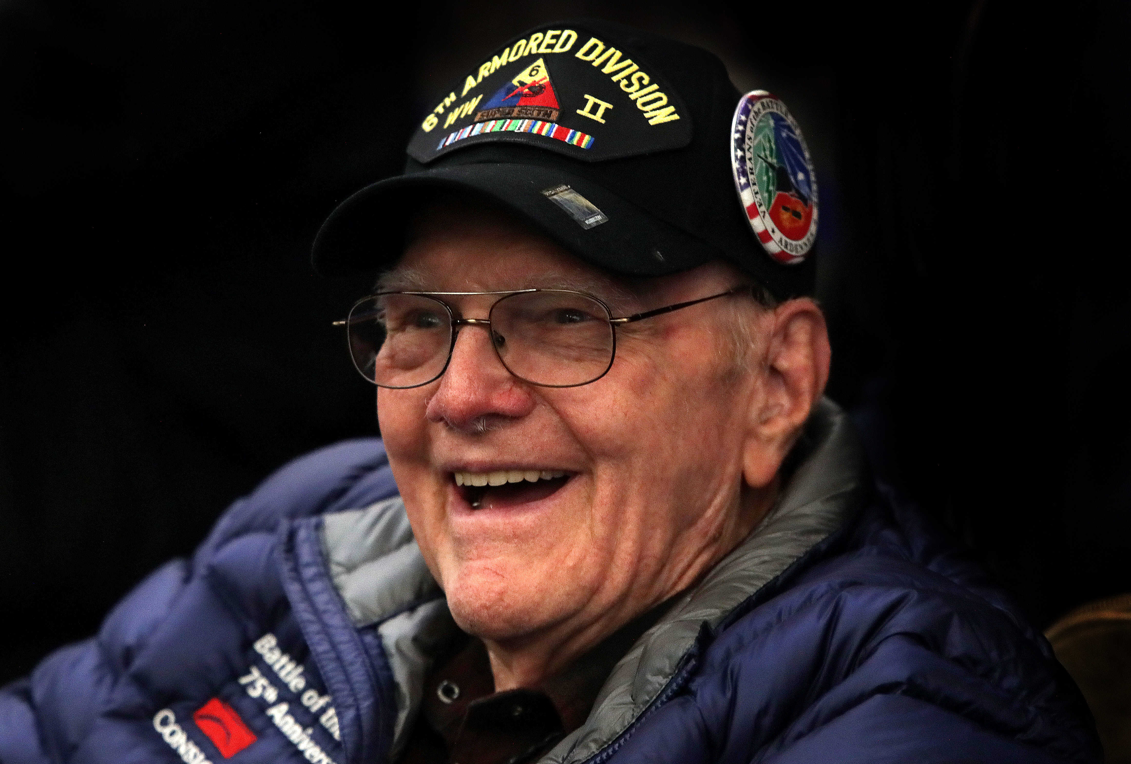 Anthony Wayne Field of Colorado at Logan Airport before he departed for France to commemorate the 75th anniversary of the Battle of the Bulge.