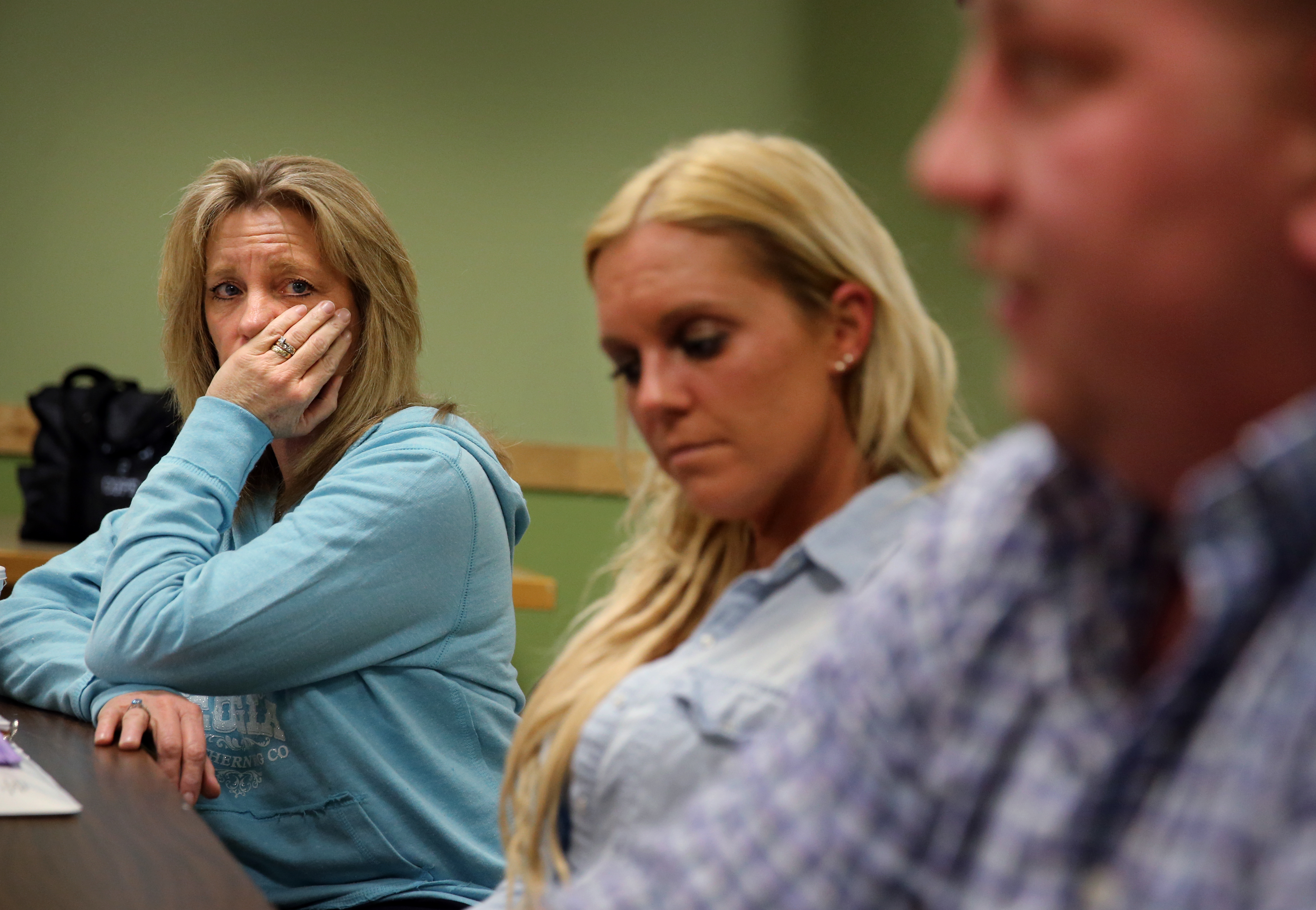 Joanne Peterson (left) listened to guest speakers Sarah O’Brien and Mark Devereaux.