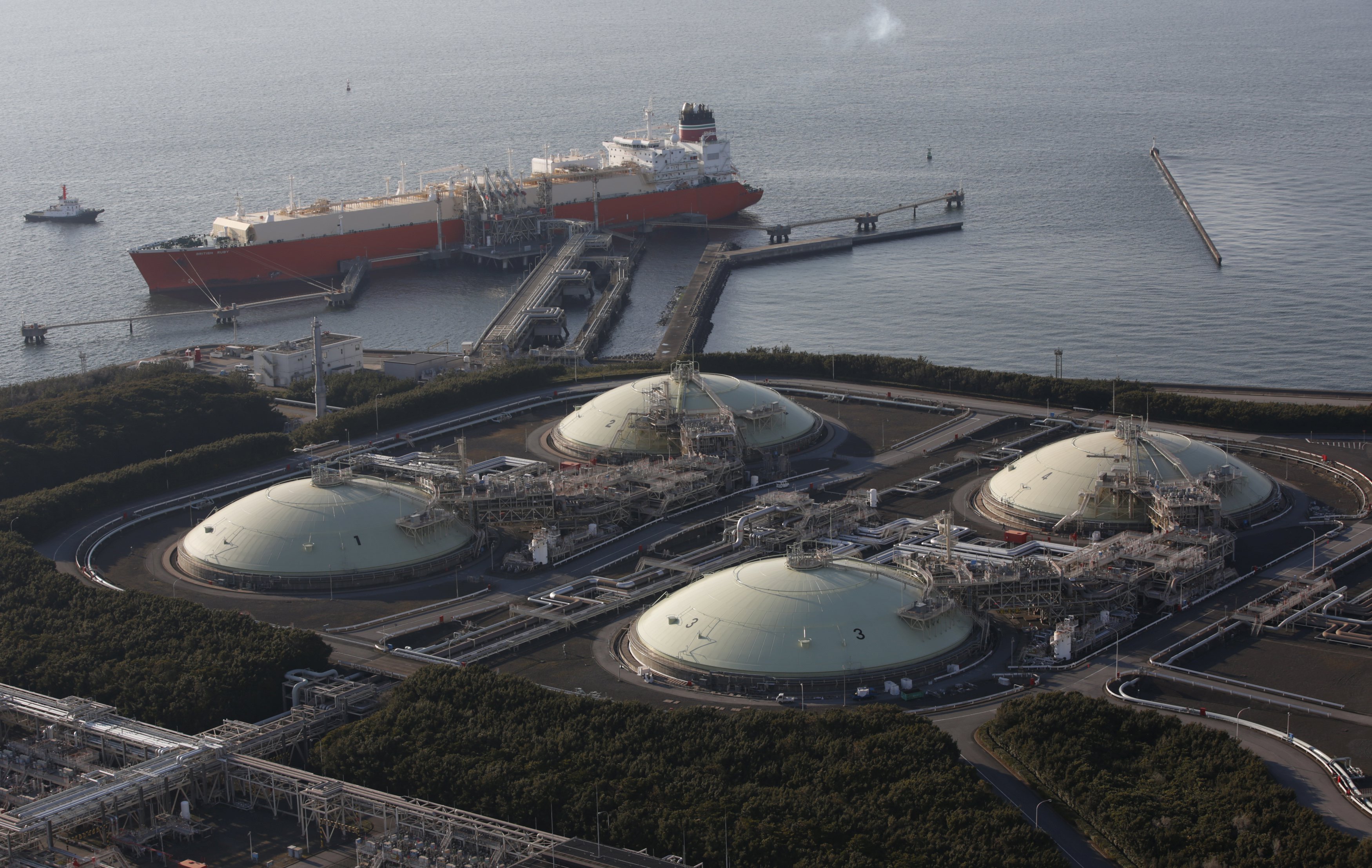 Above: An LNG tanker at a power plant near Tokyo. Energy companies will be sending more tankers to New England this winter.