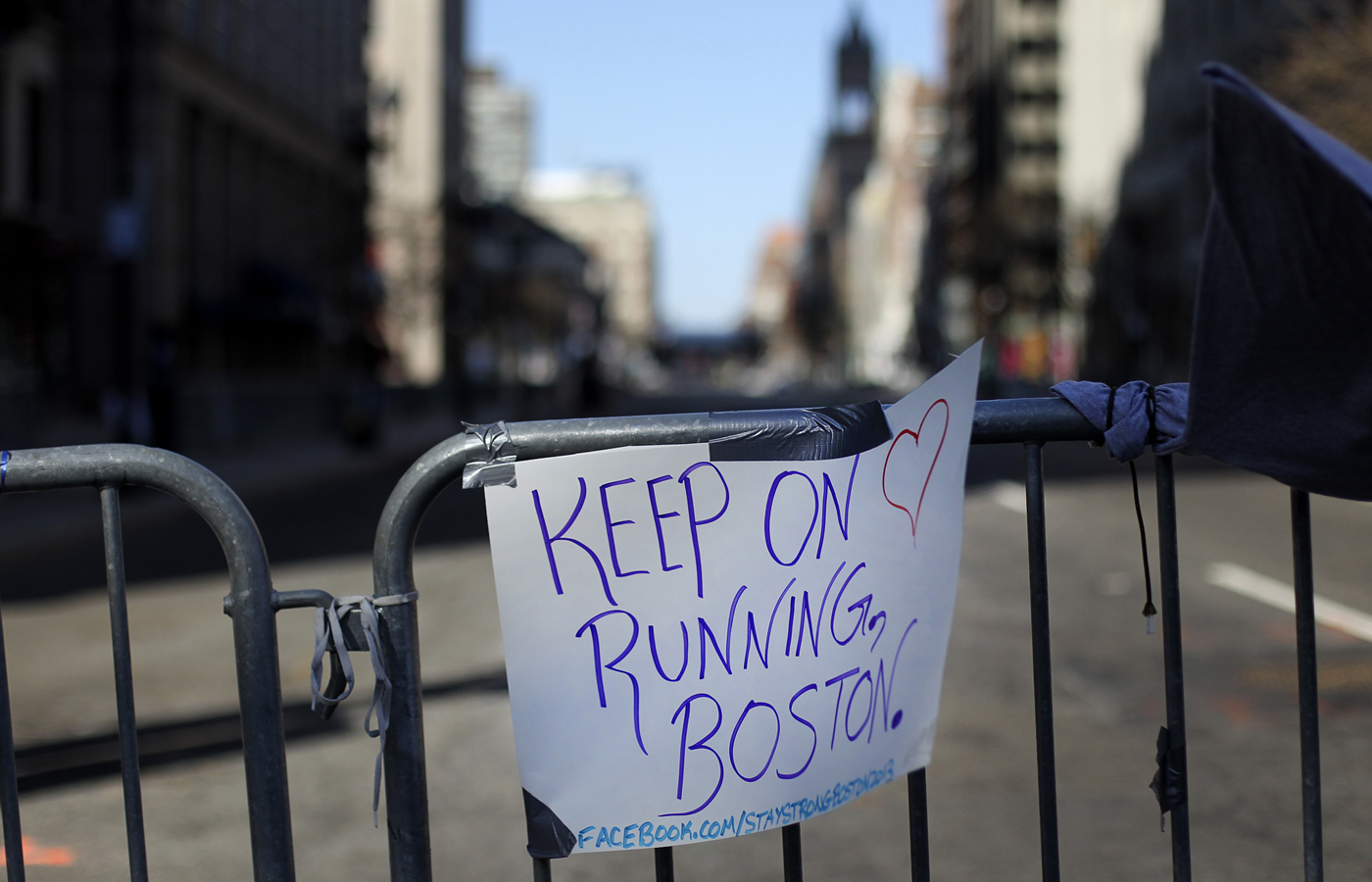 A note of support and defiance was posted on a barricade on Boylston Street, near the site of the twin bombings.