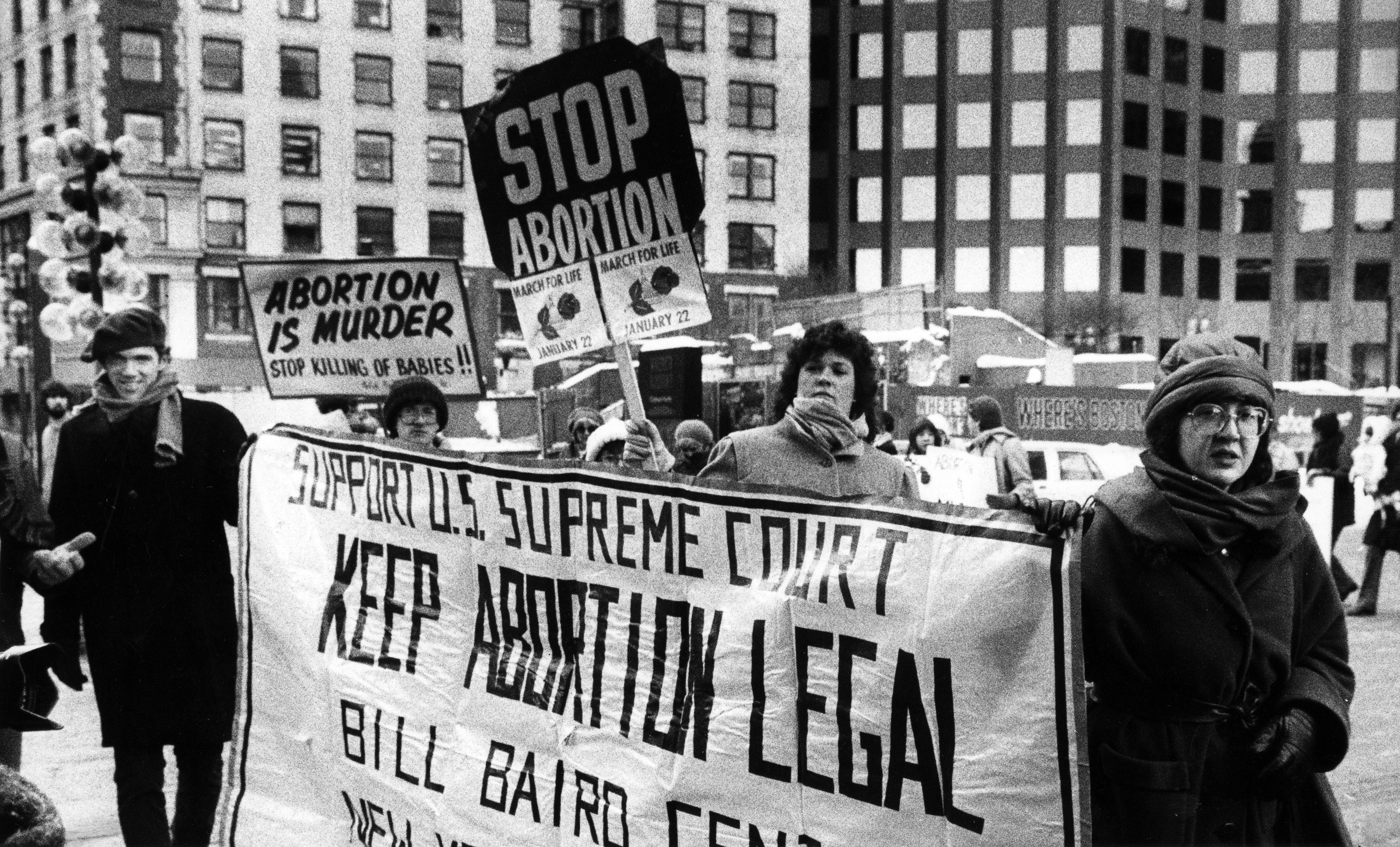 Protests both for and against abortion outside Faneuil Hall on Jan. 22, 1984.