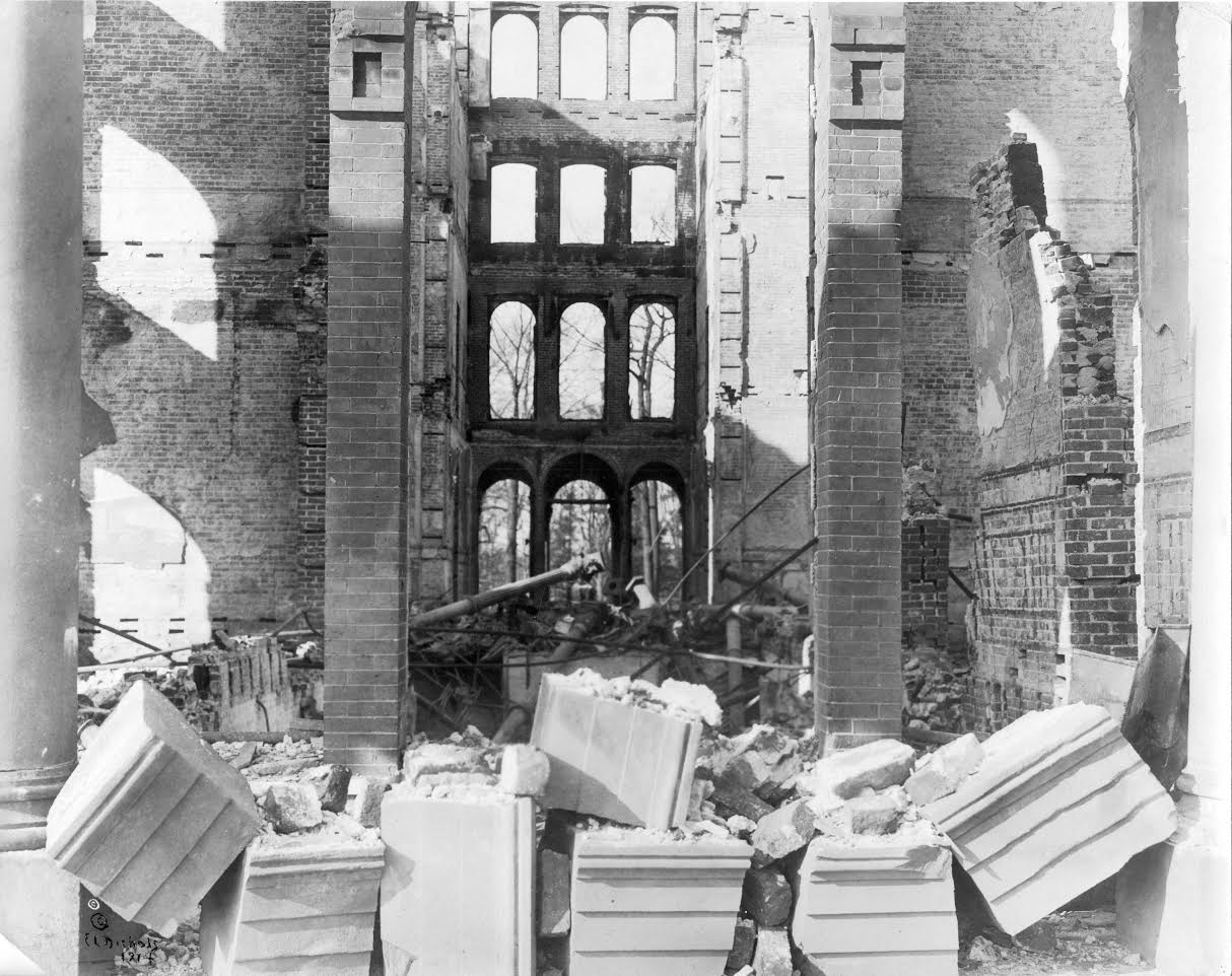 Only the masonry walls of Wellesley’s centerpiece College Hall were left standing after the fire in March 1914.