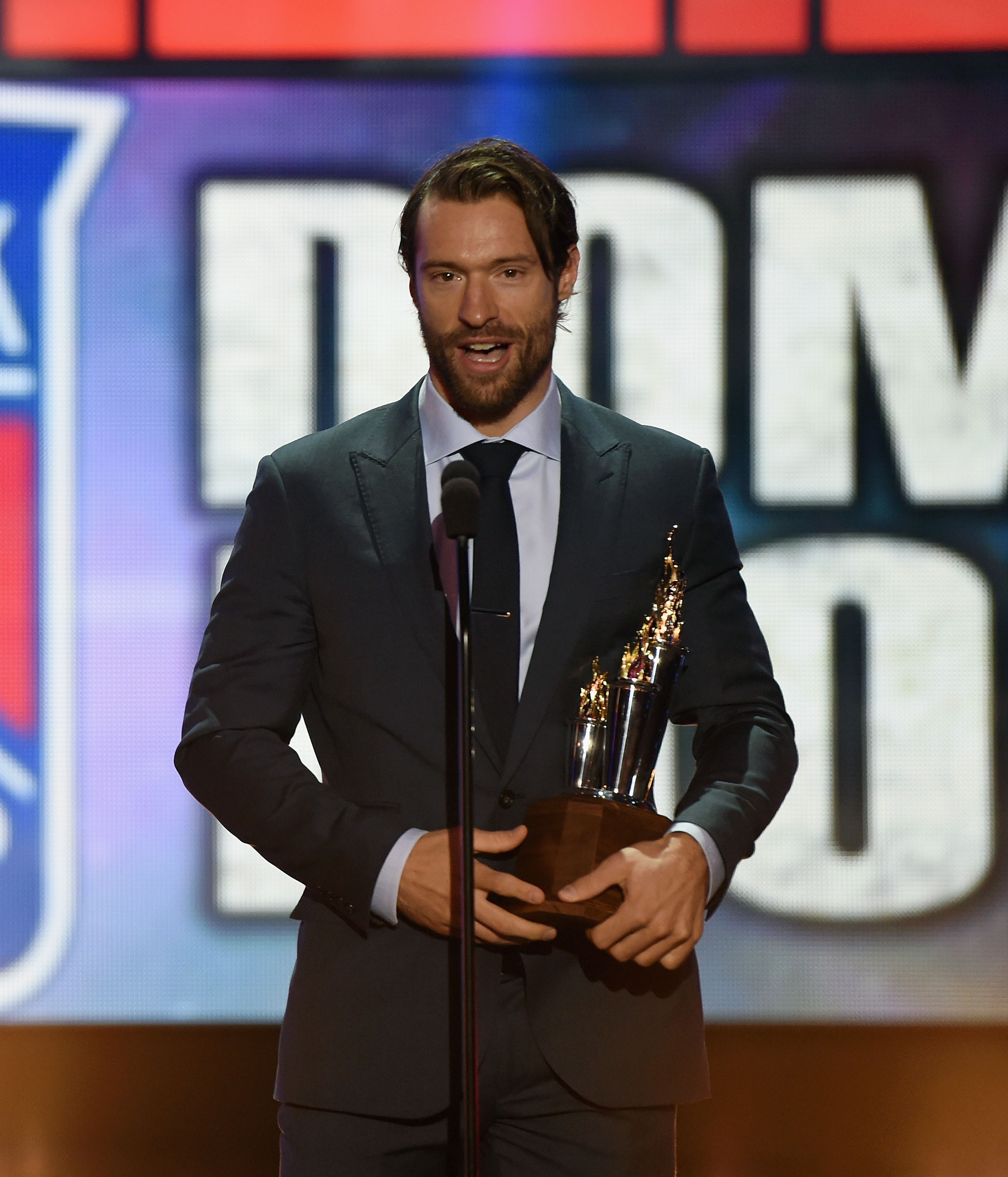LAS VEGAS, NV - JUNE 24: Dominic Moore of the New York Rangers speaks after winning the Bill Masterson Memorial Trophy during the 2014 NHL Awards at the Encore Theater at Wynn Las Vegas on June 24, 2014 in Las Vegas, Nevada. (Photo by Ethan Miller/Getty Images)