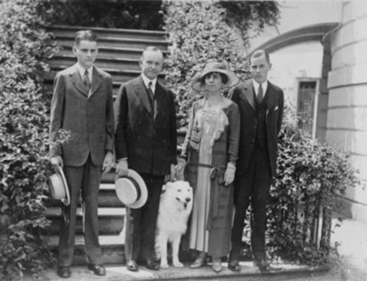 Calvin Coolidge stood at the White House in 1924 with his sons Calvin Jr., left, John, right, and his wife Grace.