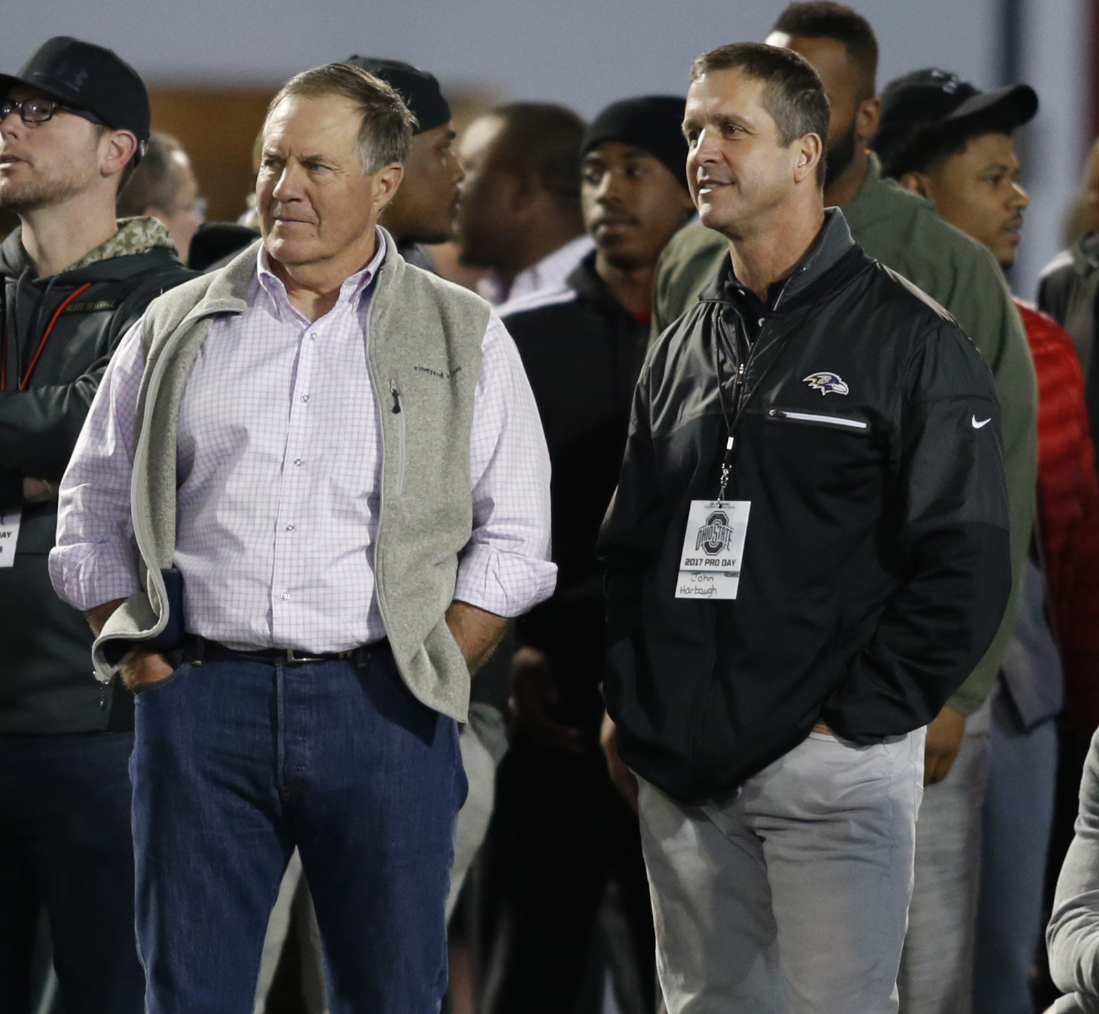 Baltimore Ravens coach John Harbaugh, right, does not think Bill Belichick is slowing down.