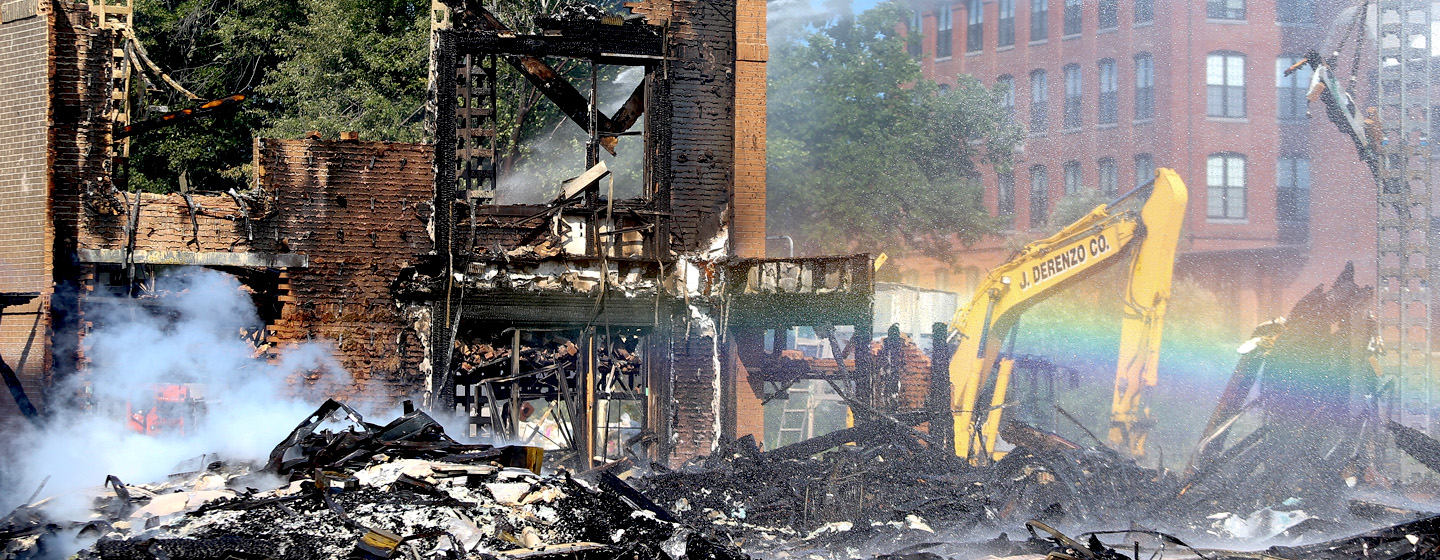 The July 23 fire at an apartment building under construction in Waltham was blamed on arson.