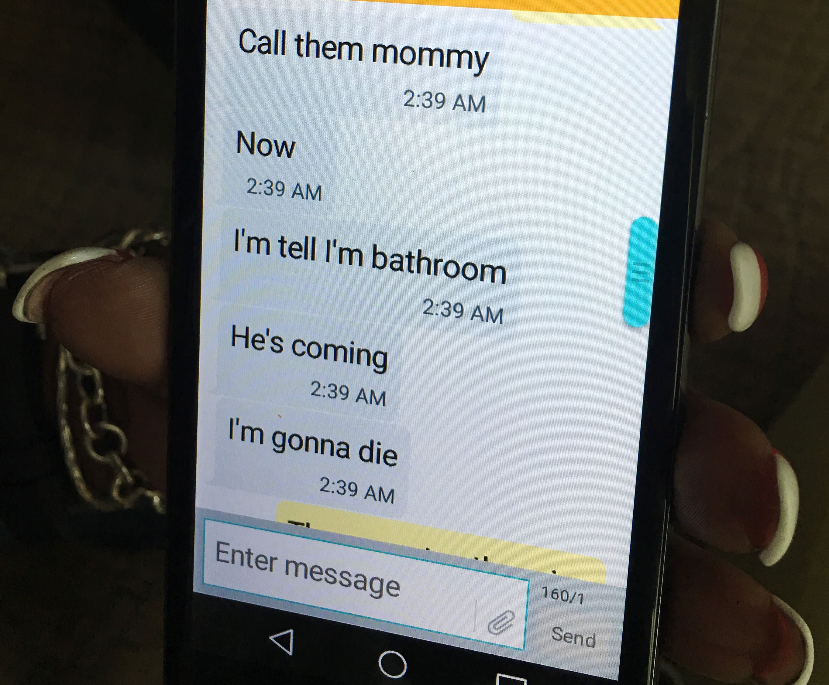 Mina Justice showed a text she received from her son.