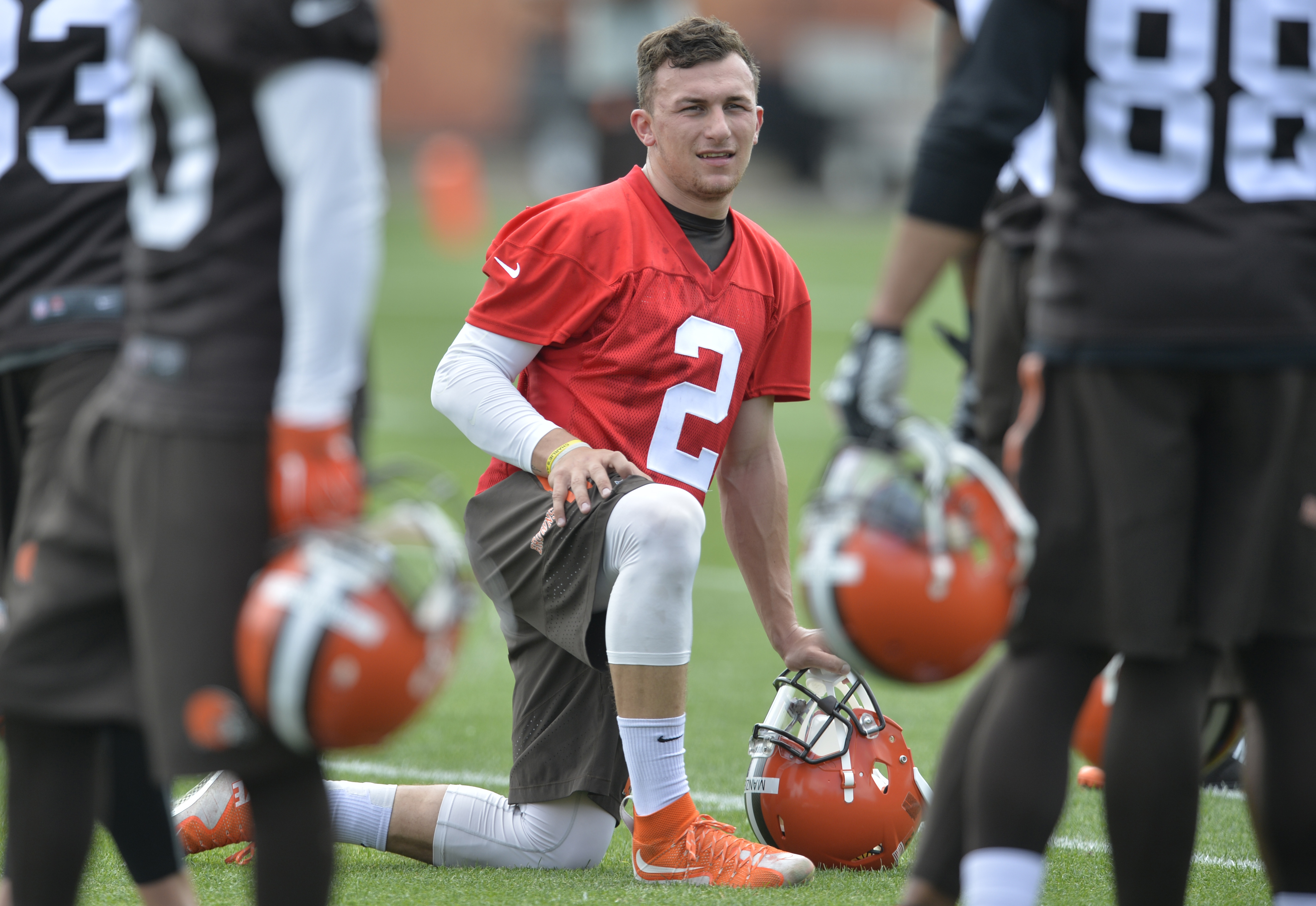 Johnny Manziel’s high school coach is living with him to try to keep him on track.