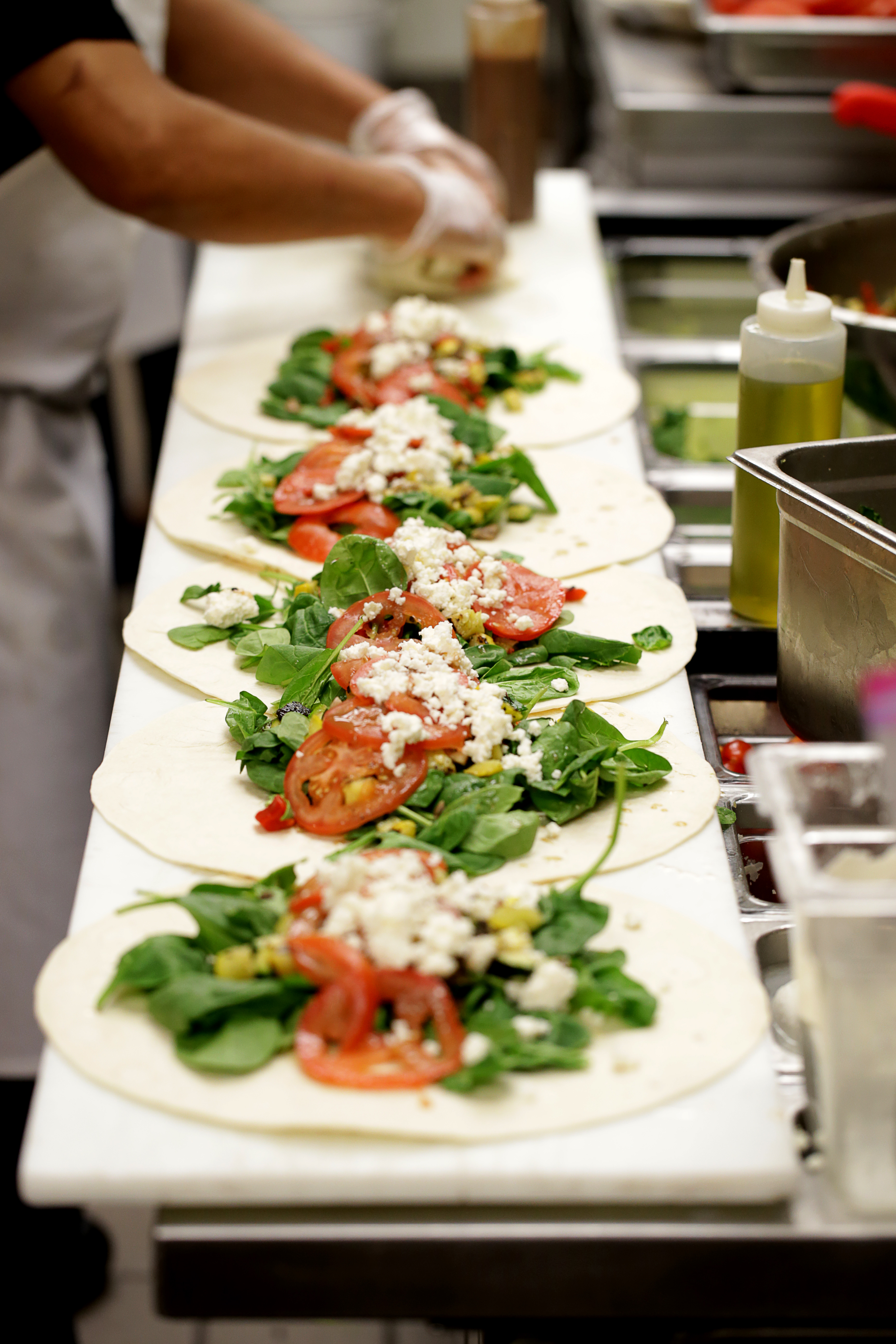 A wrap assembly line at Salvatore’s.