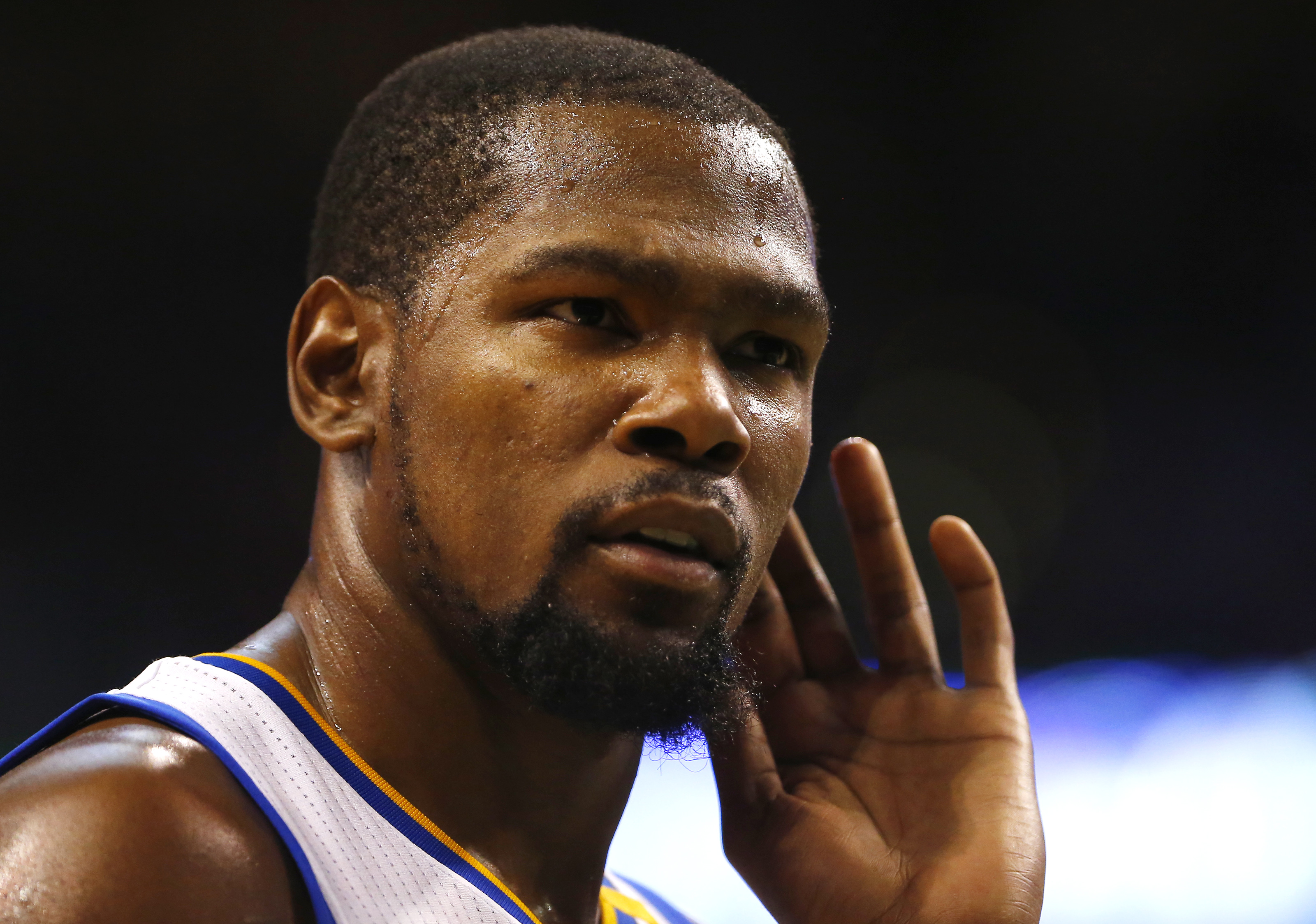 Kevin Durant gestures to someone in the crowd at TD Garden on Nov. 18.