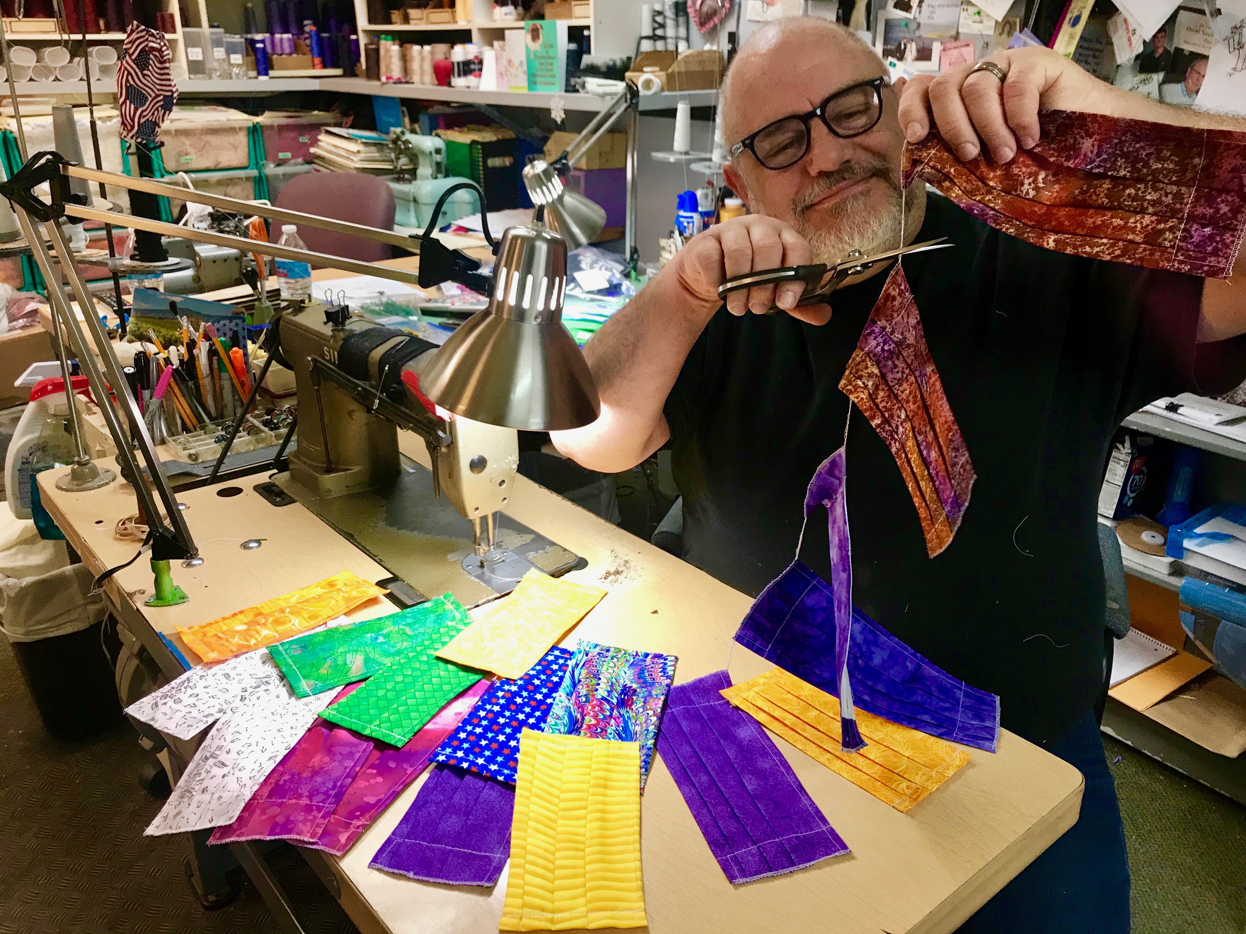 Fashion designer David Josef has put designing wedding dresses on hold to make thousands of masks which he donates.