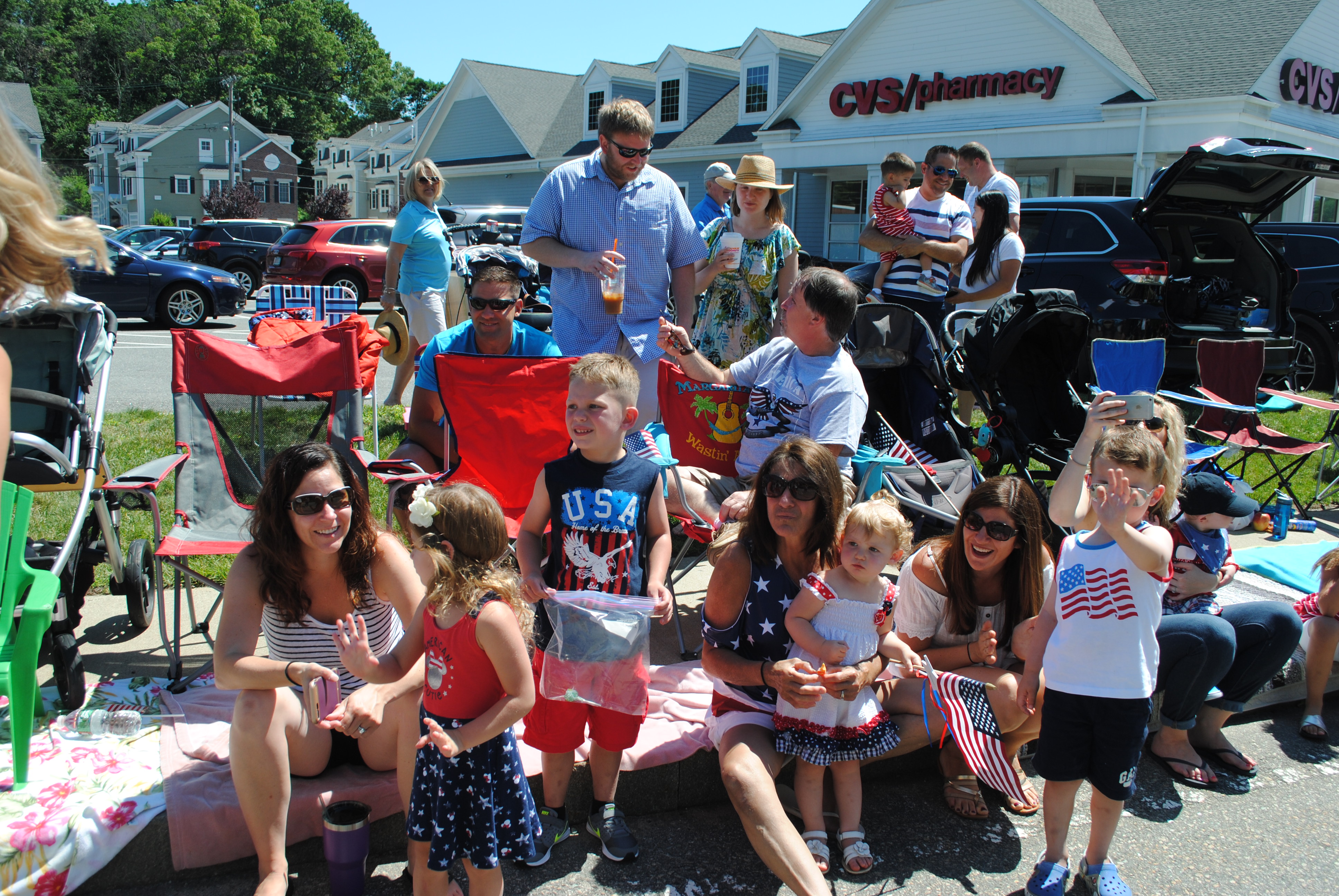 Families watch the Fourth of July parade in Burlington.